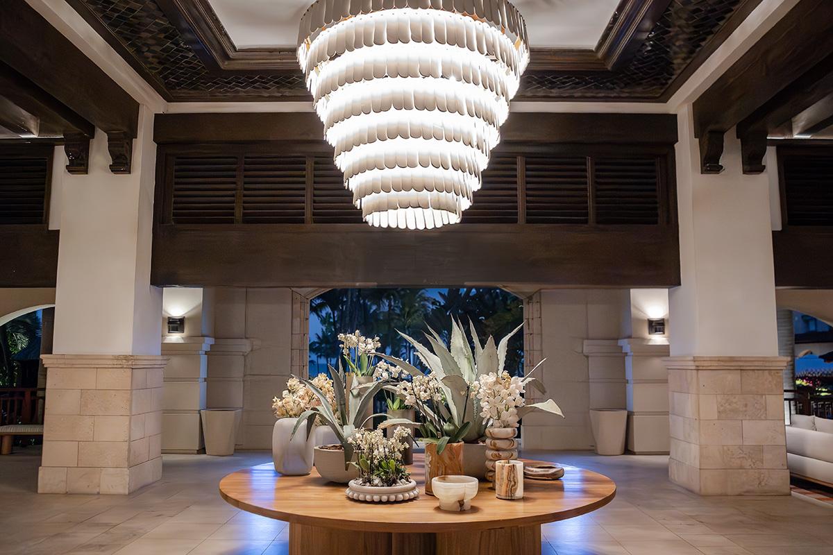 Hyatt Regency Aruba open-air lobby entrance and reflecting pools at dusk