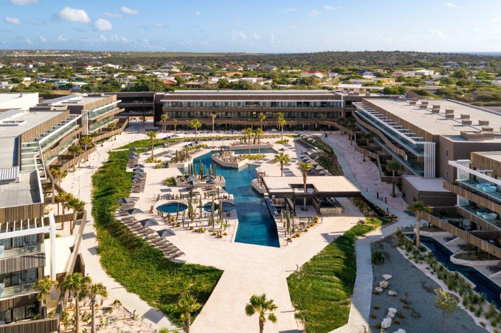 Secrets Baby Beach Aruba aerial panoramic view of resort and turquoise lagoon