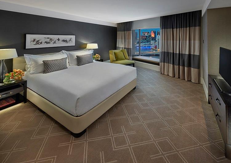 Executive Suite featuring private parlor, dining area, and master bedroom