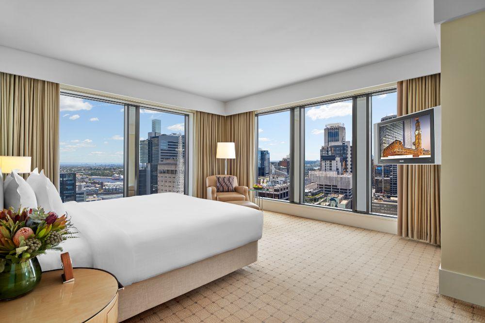 Executive Suite master bedroom with plush king bed