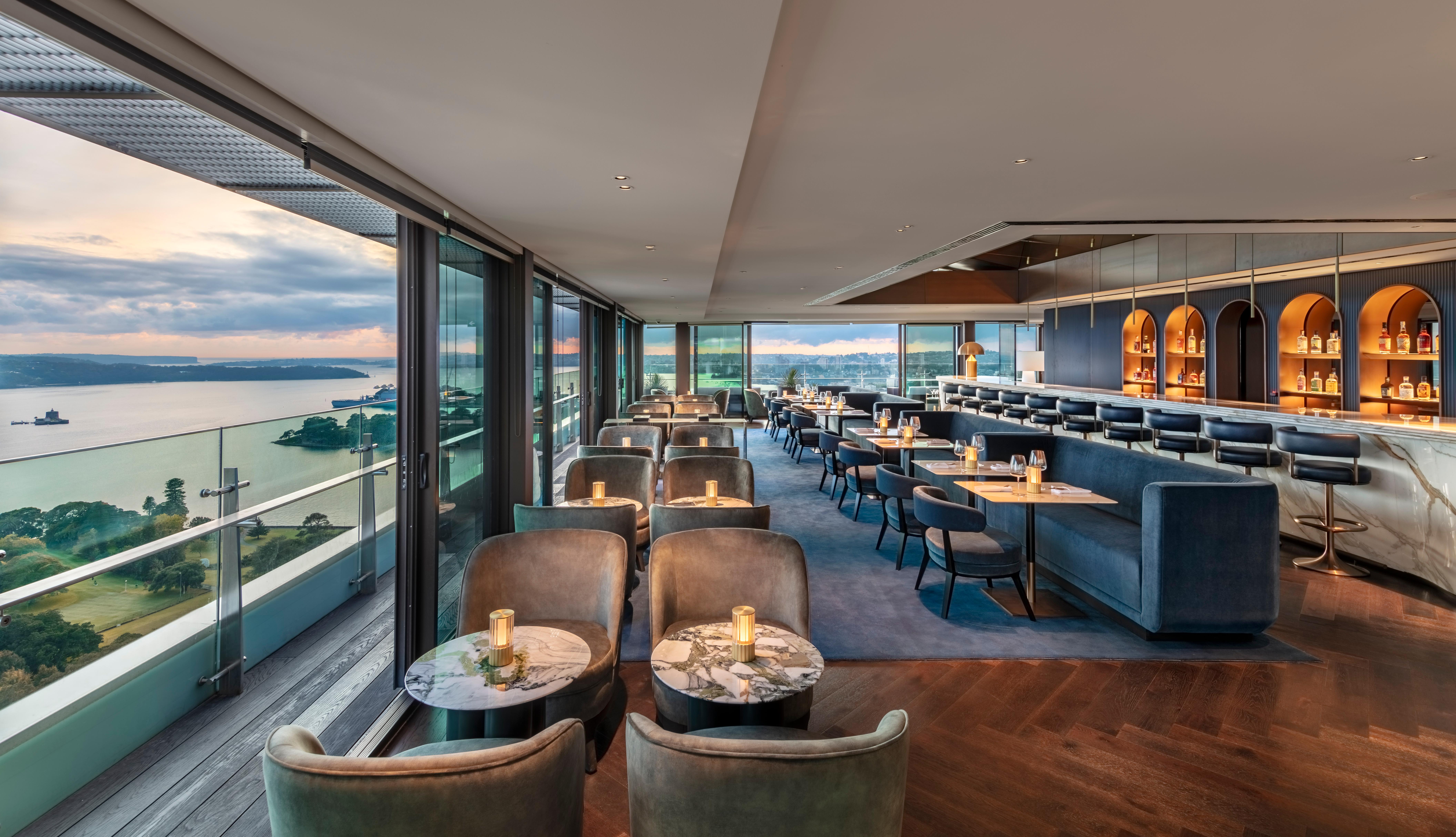 Aster level-32 rooftop lounge offering 270-degree views of Sydney Harbour and the Opera House