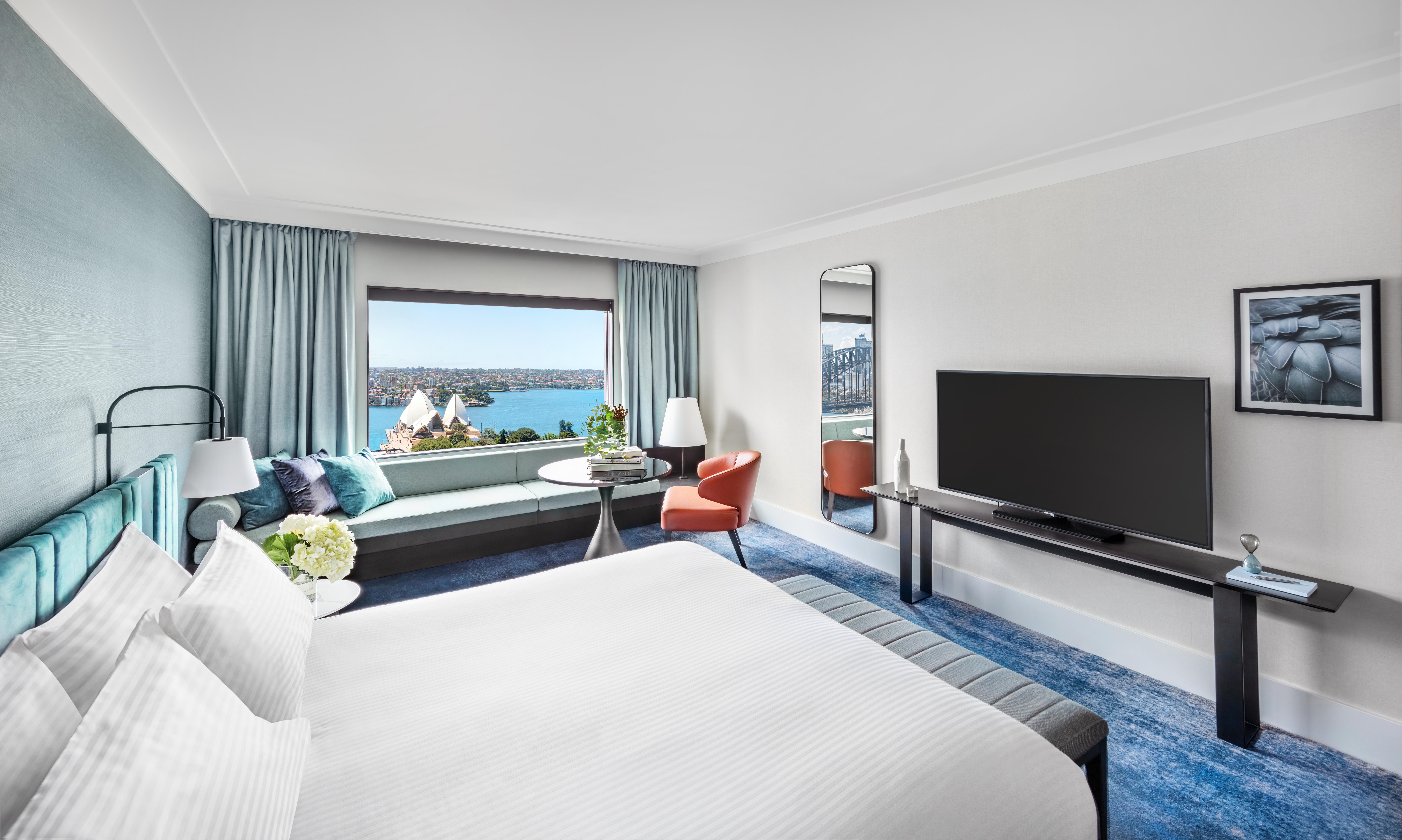 King Opera House Room with window-side chaise lounge overlooking the Opera House sails