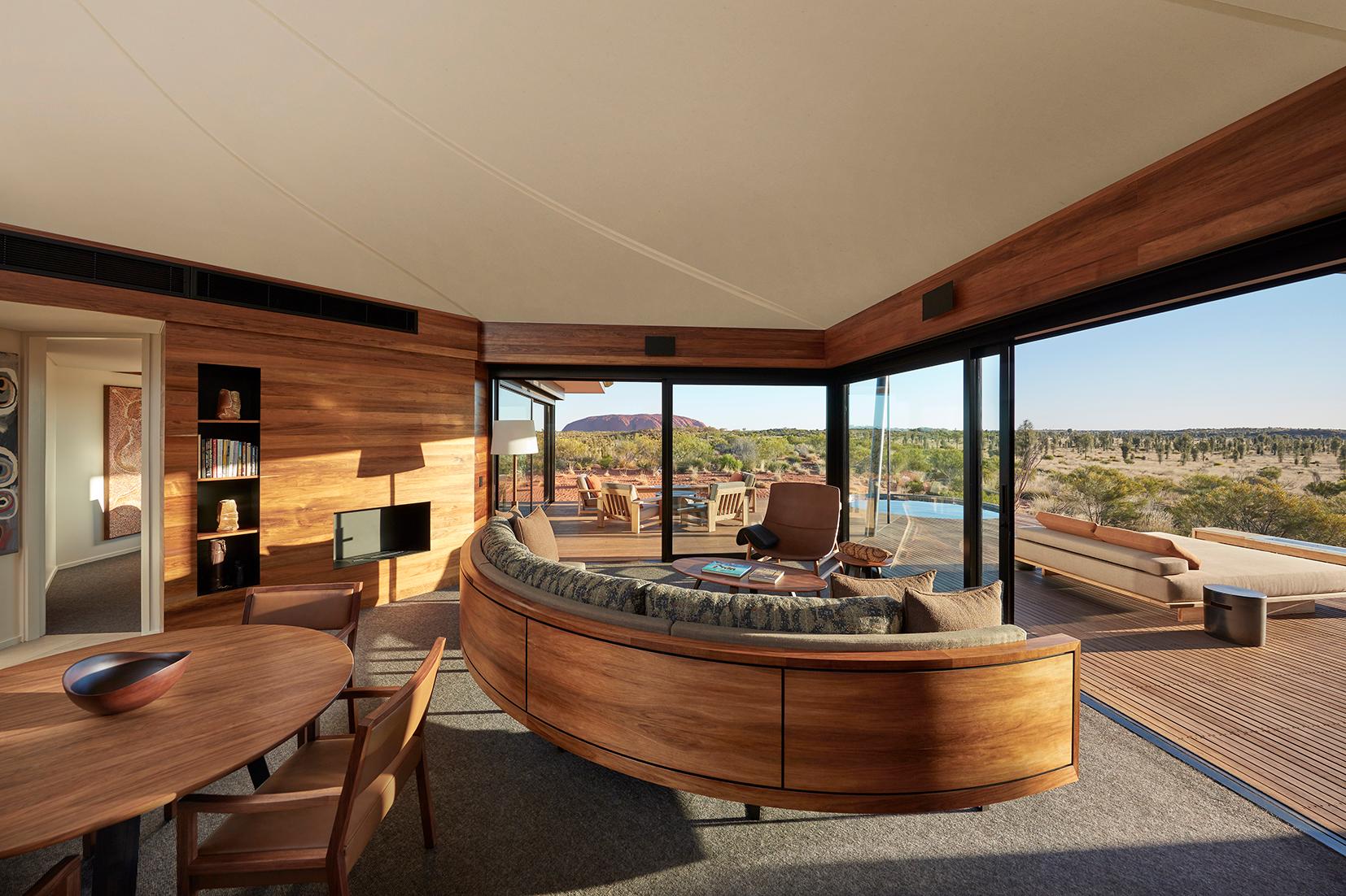 Dune Pavilion open-plan living room with plunge pool overlooking both Uluru and Kata Tjuta