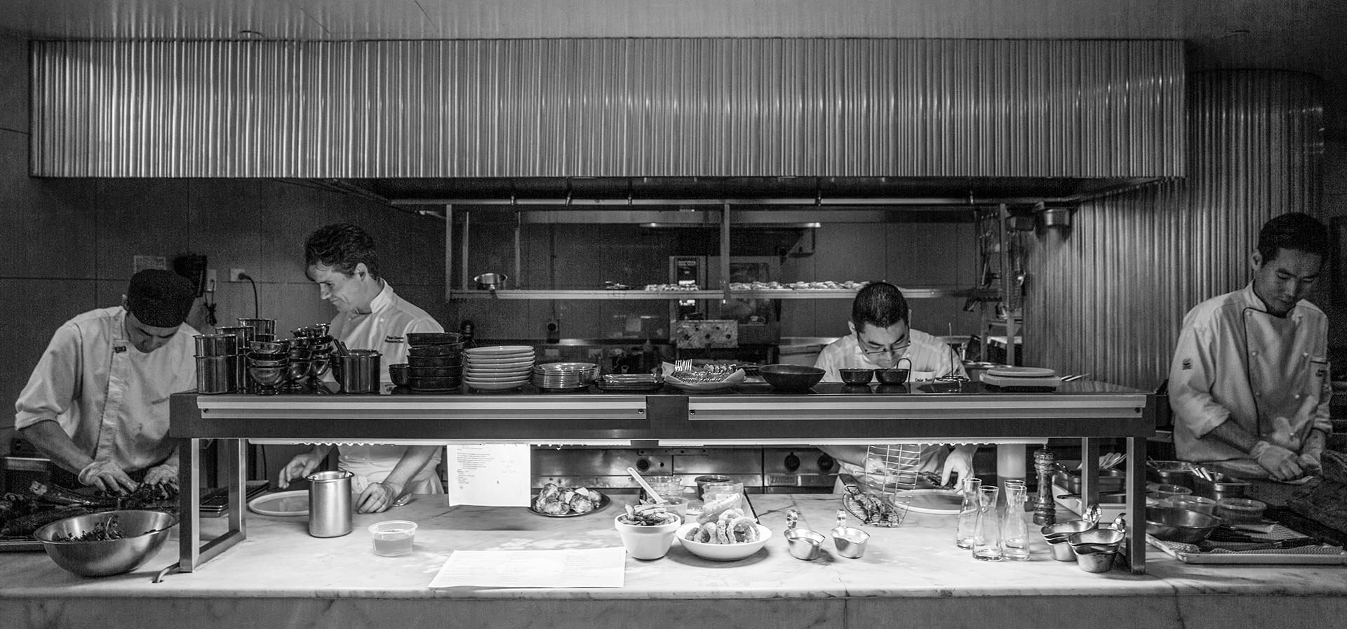 Award-winning radii restaurant and bar featuring multi-tiered open kitchen design