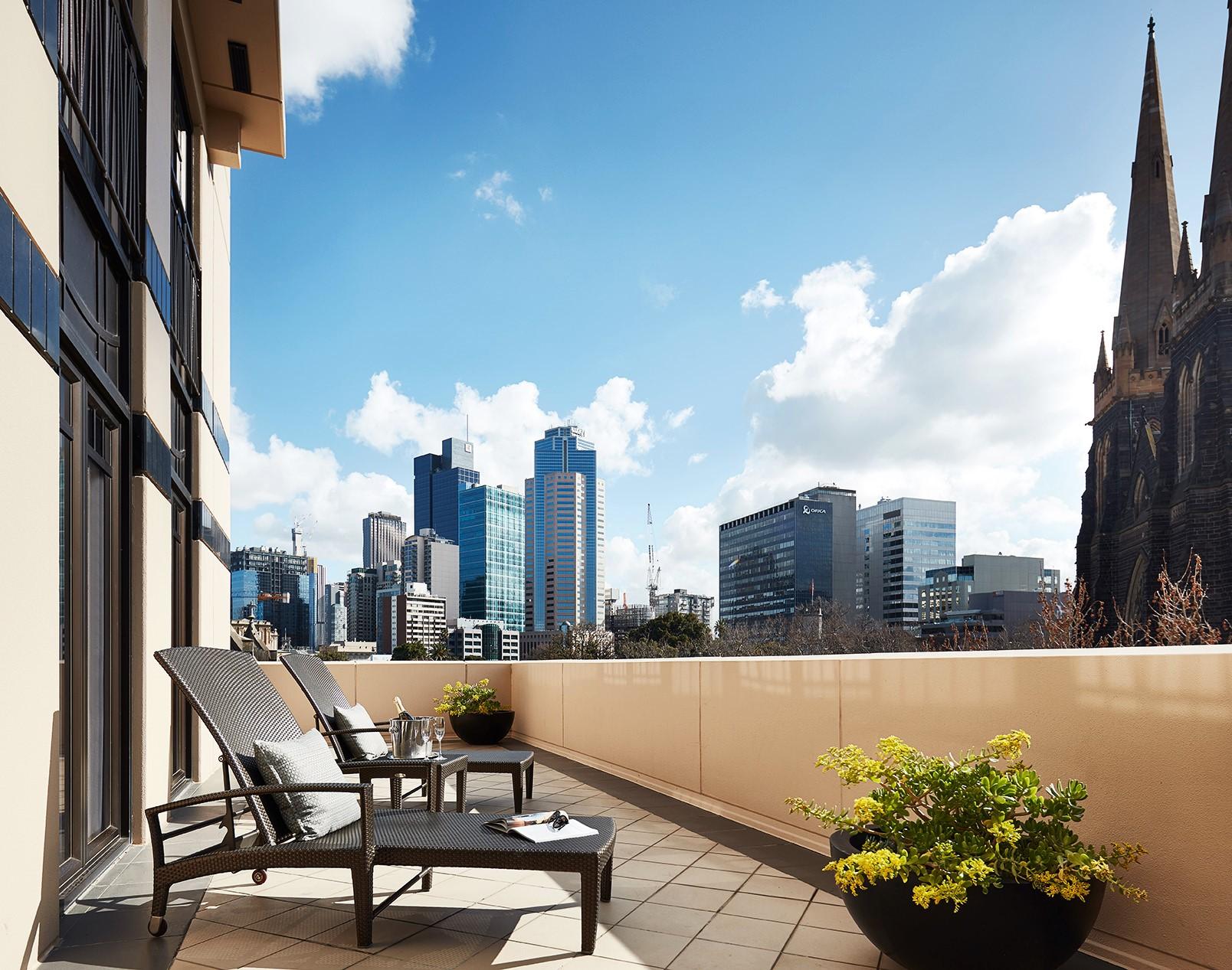 Terrace Suite with private outdoor balcony framing panoramic St Patricks Cathedral views