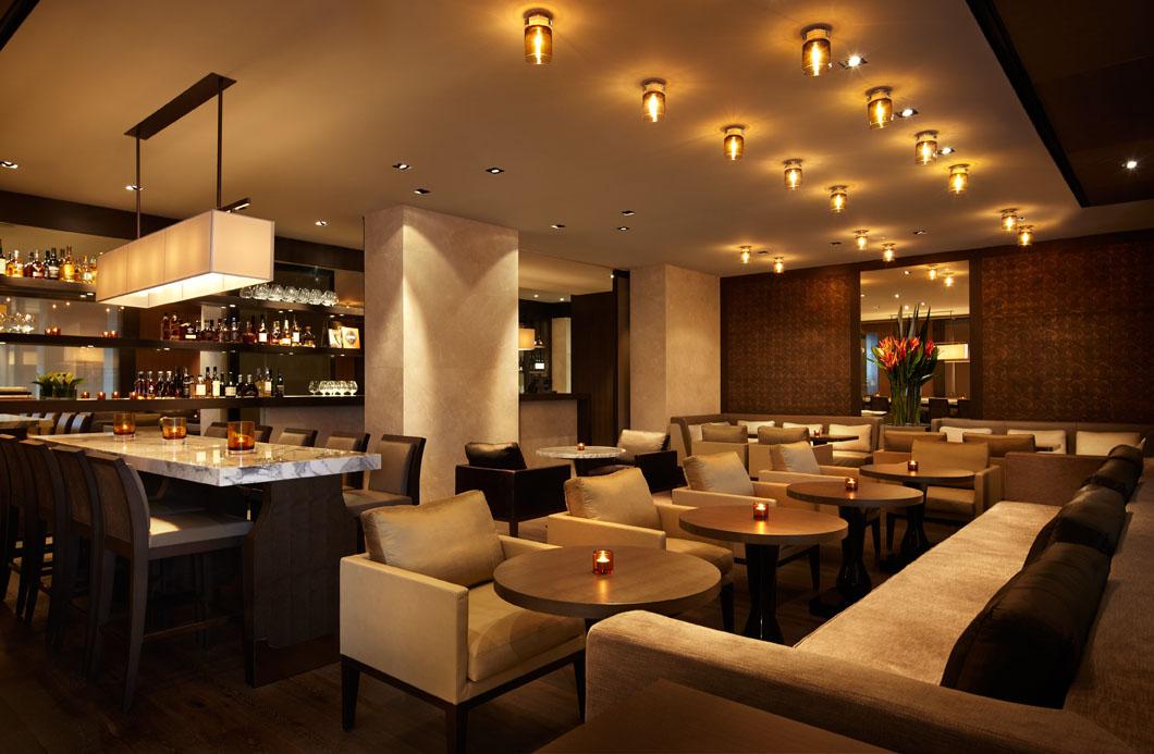 The Bar cocktail lounge featuring warm backlighting and curated Australian spirits