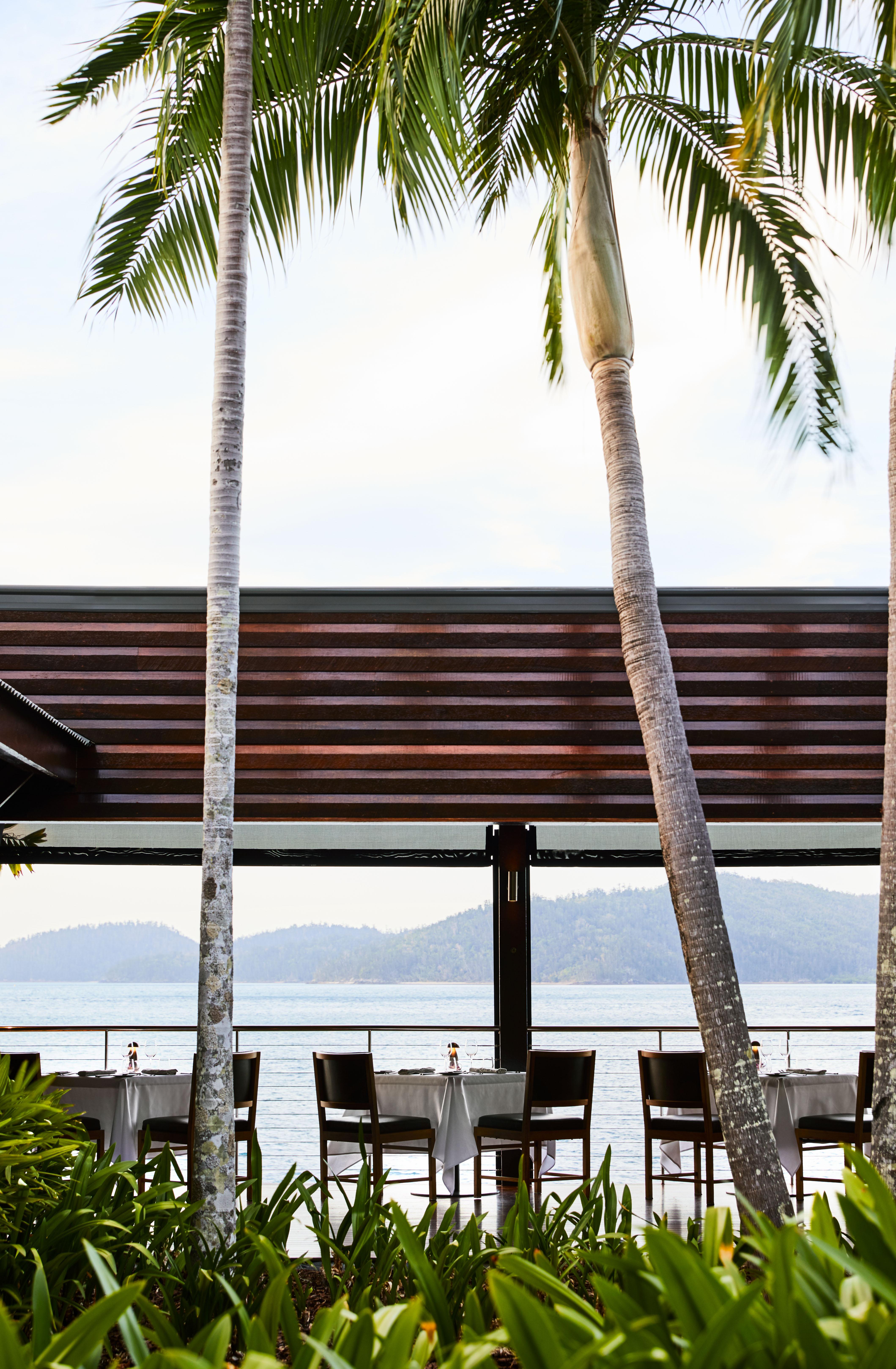 Pebble Beach casual waterfront restaurant and swimming pool on the waters edge