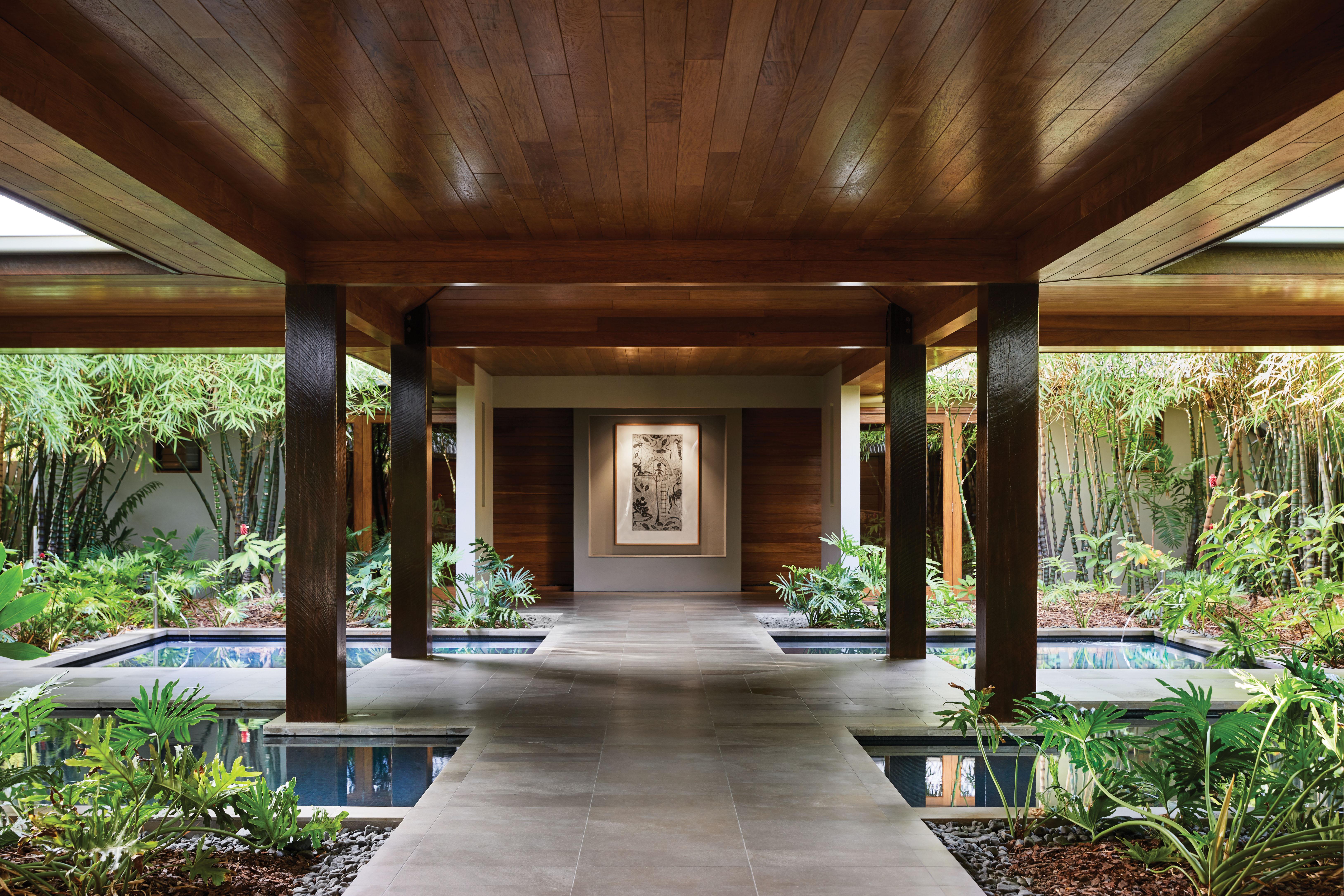 Spa qualia outdoor relaxation tranquility pools surrounded by tropical eucalyptus greenery