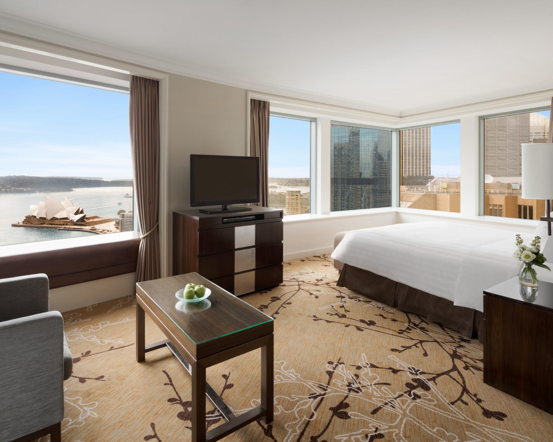 Grand Premier Sydney Harbour Room framing unobstructed panoramic views of the Opera House and Harbour Bridge