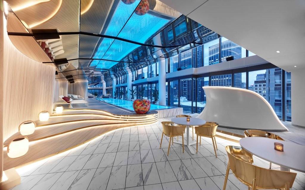 W Melbourne Level 14 WET pool beneath gold ceiling