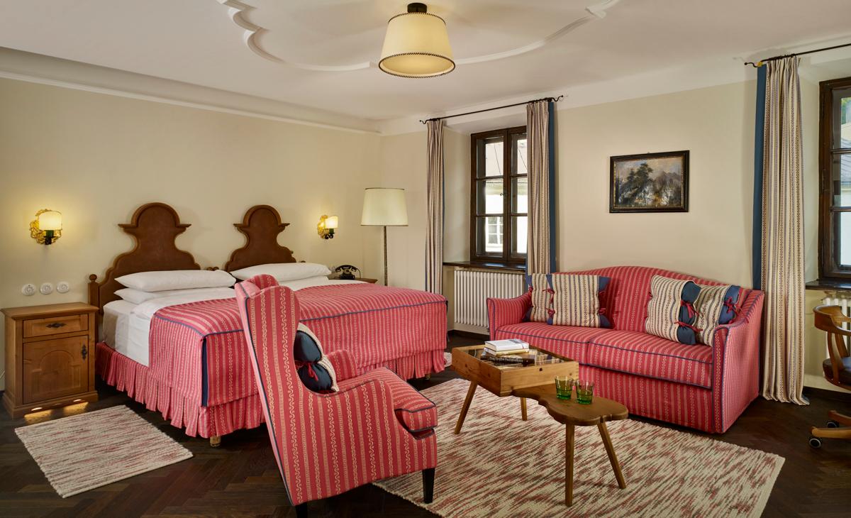 One Bedroom Suite featuring authentic Salzburg antiques and Fleckerlteppich rugs