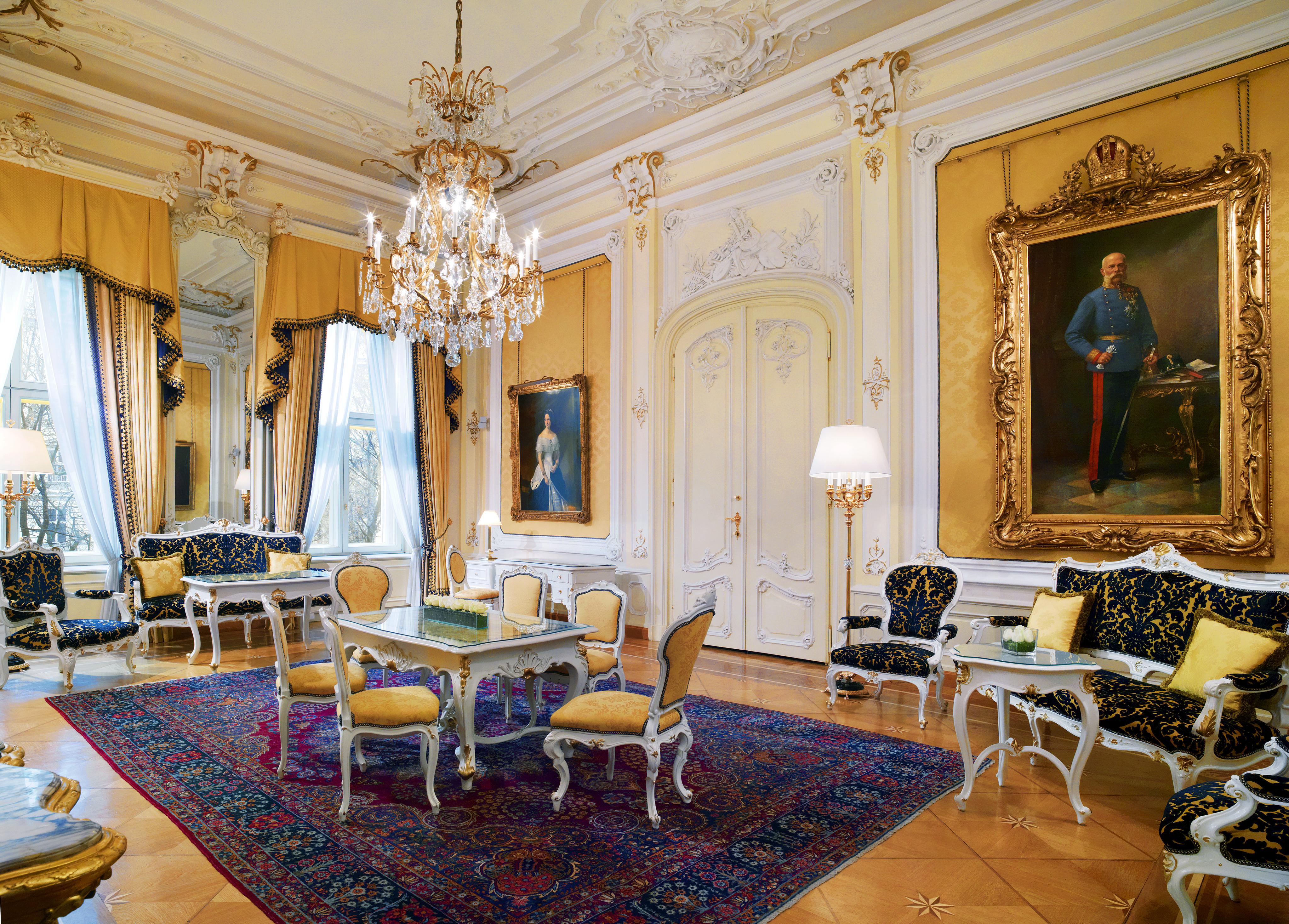 Palatial Royal Suite with 7-meter high stucco ceilings, crystal chandeliers, and private butler service