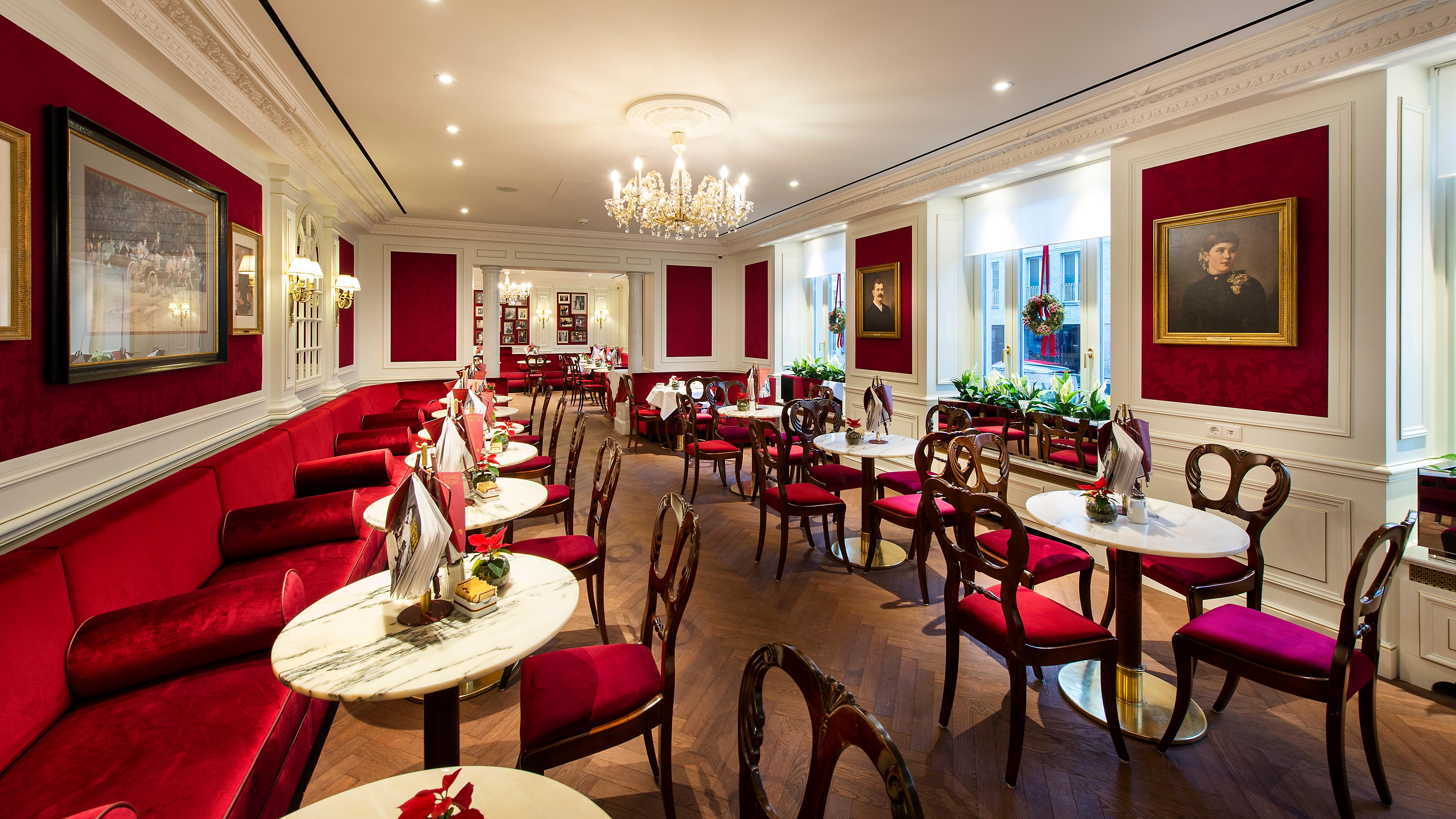 Café Sacher Salzburg riverside terrace serving Original Sacher-Torte