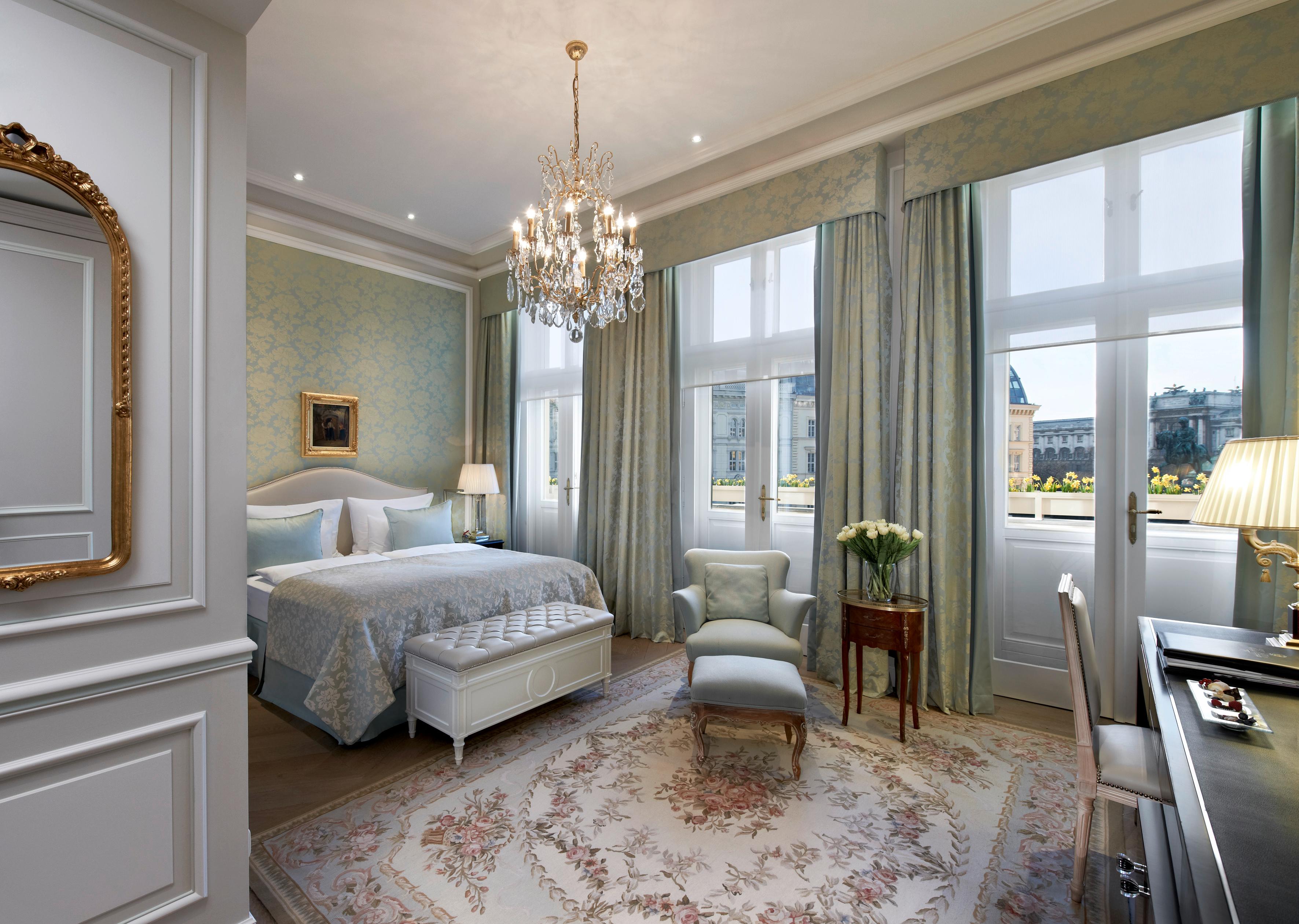 Deluxe Double Room featuring antique Austrian paintings and marble bath