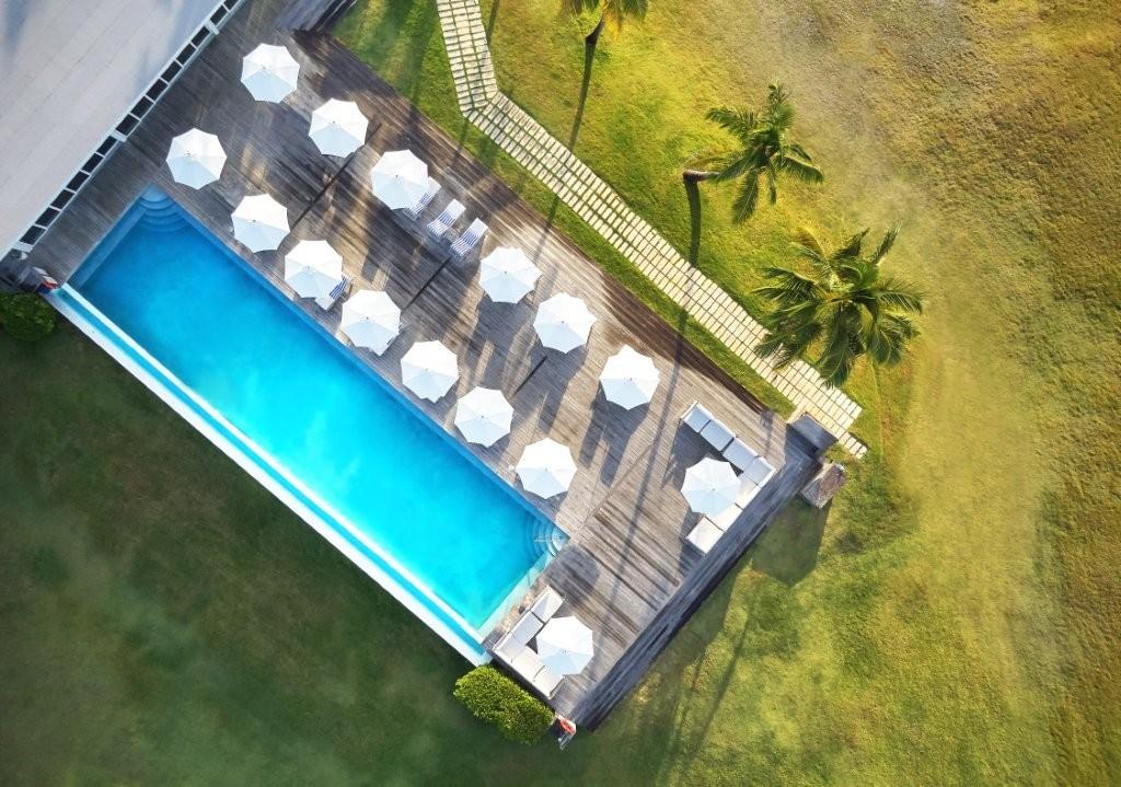 Hilltop freshwater infinity pool overlooking the turquoise Caribbean ocean