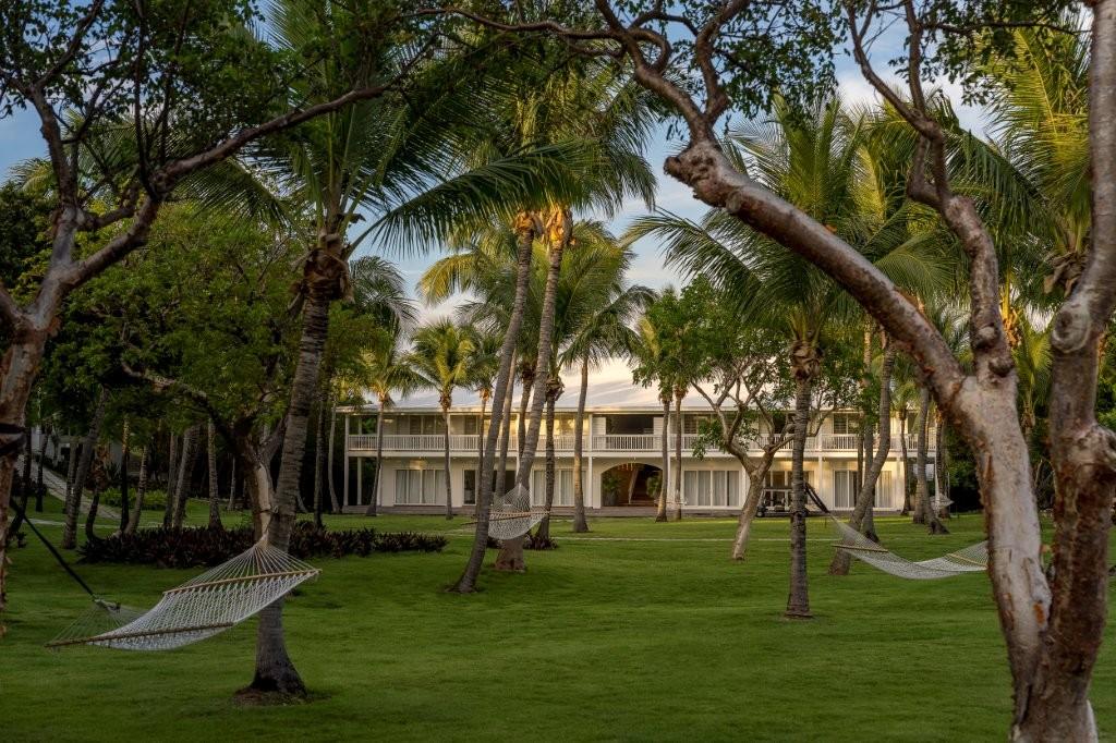 Two-Bedroom Suite cottage surrounded by lush tropical landscaping