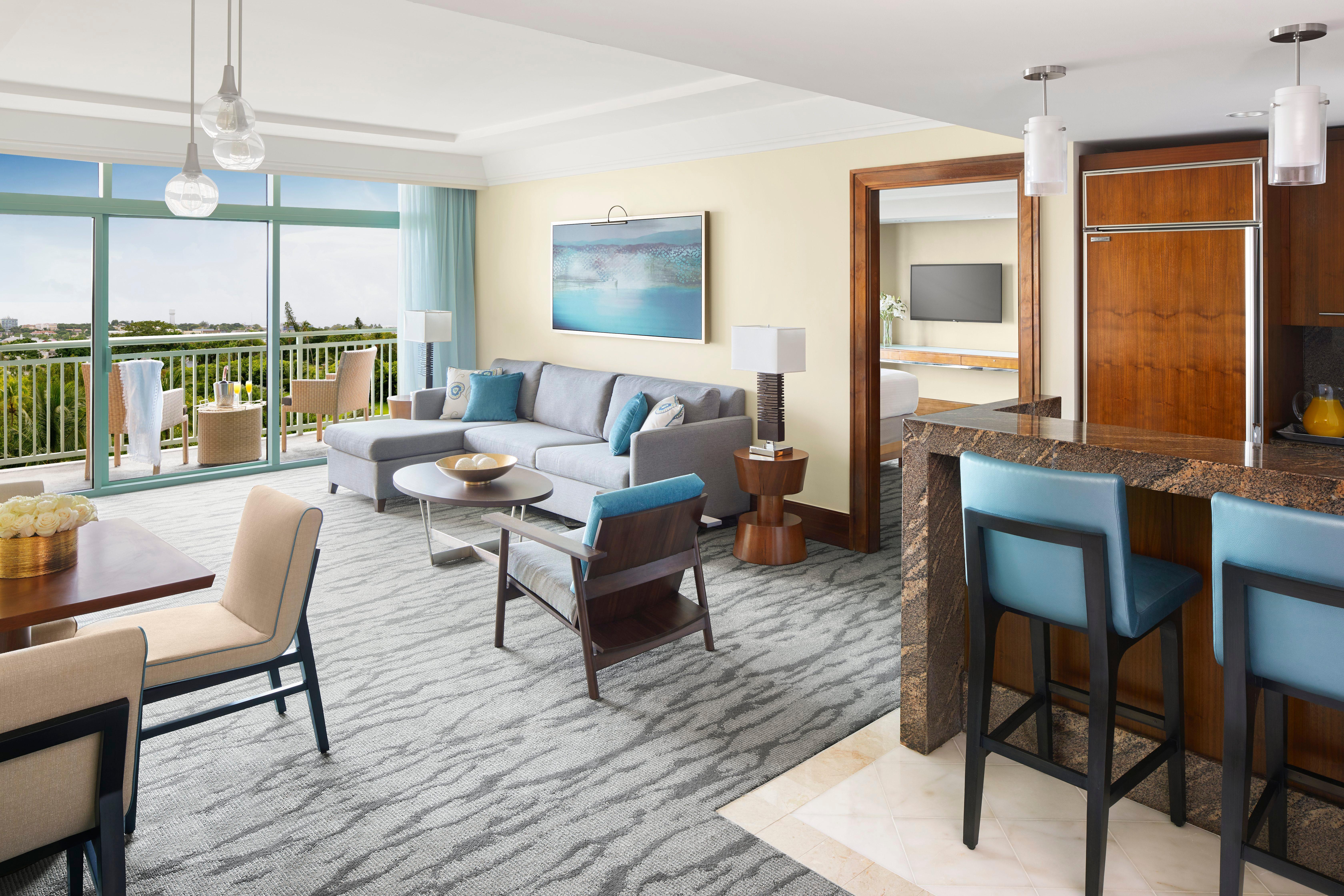 One-Bedroom Suite living room with terrace overlooking the Caribbean