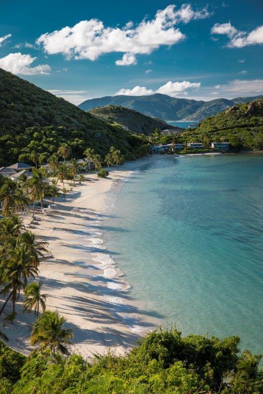 Pristine white sand and turquoise waters of Deadmans Beach at Peter Island Resort