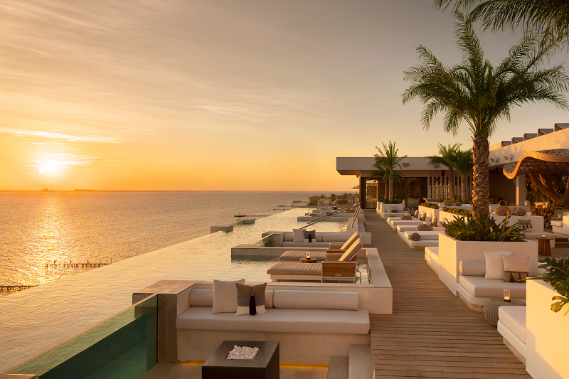 Rooftop Infinity Swimming Pool at Sunset