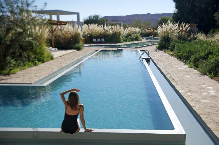 Four outdoor swimming pools and hot tubs at Explora Atacama