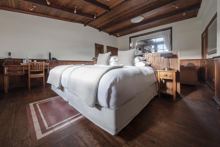 Explora Patagonia National Park luxury suite with panoramic valley windows
