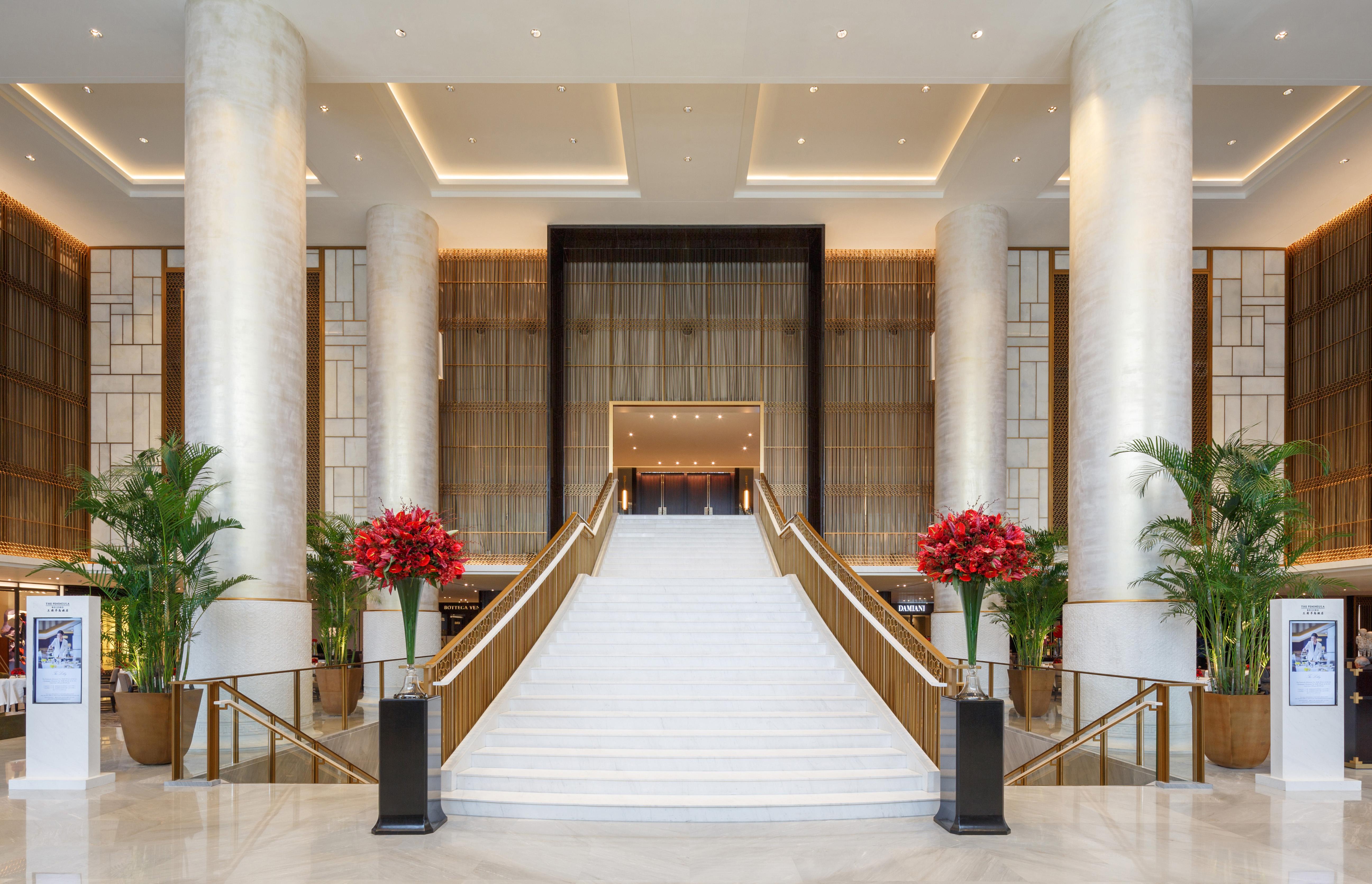 The Lobby Sweeping Marble Staircase