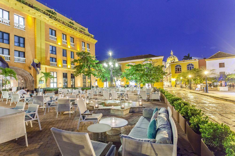 Plaza Santa Teresa evening alfresco dining beside historic walls