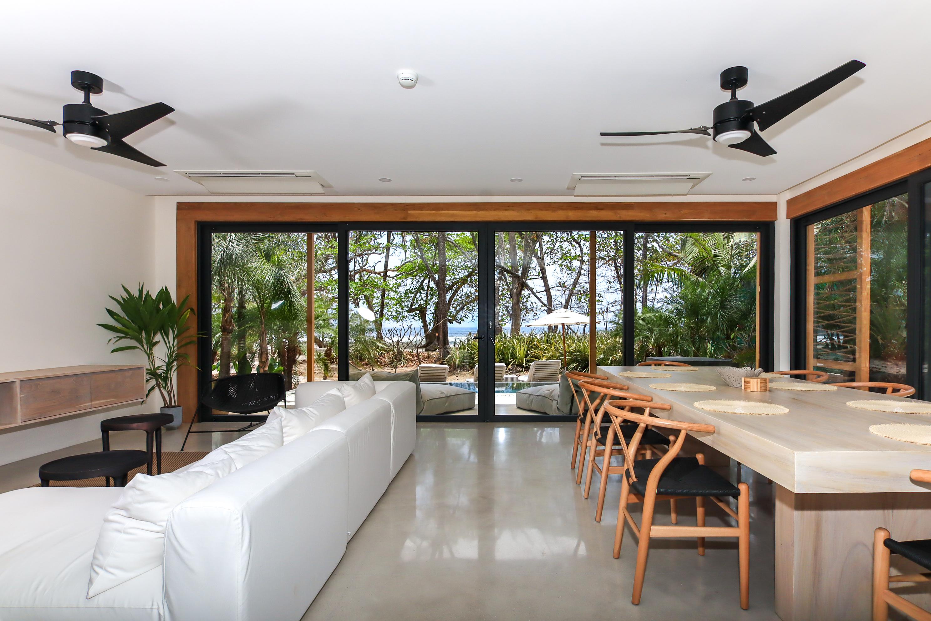 Three-Bedroom Beachfront Villa open-concept living and dining salon
