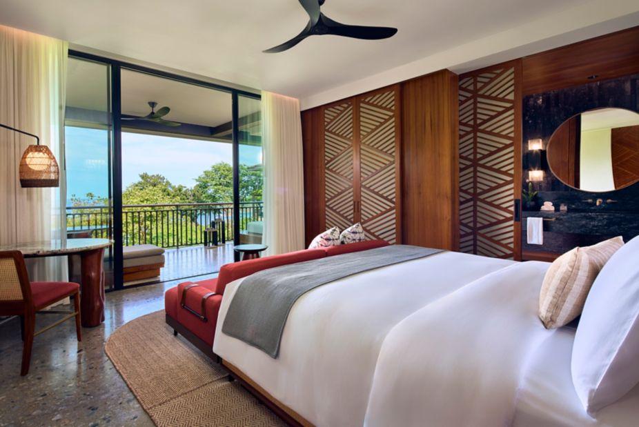 Ocean Reserve master bedroom with warm natural woods