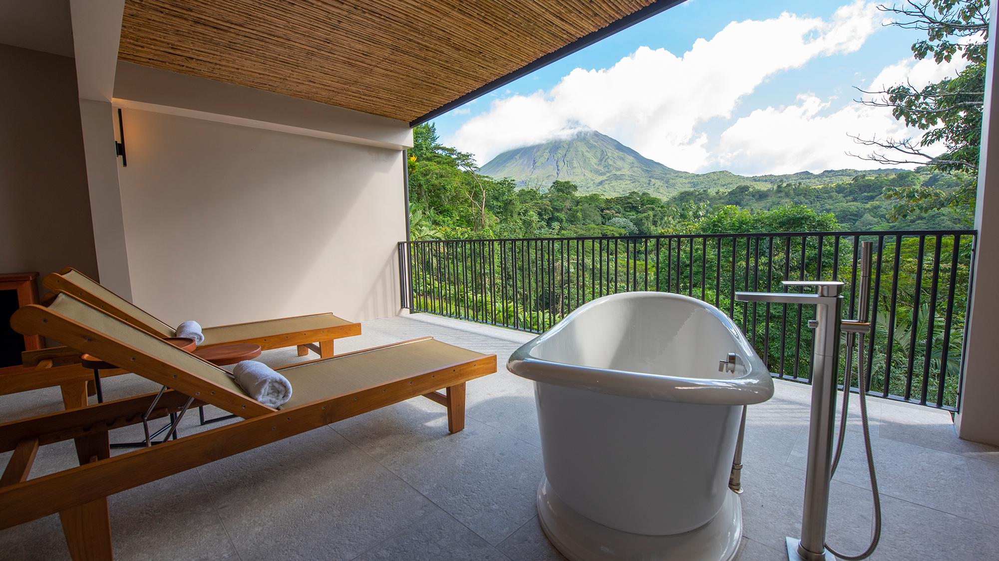 Luxury Honeymoon Suite bedroom with private rainforest terrace