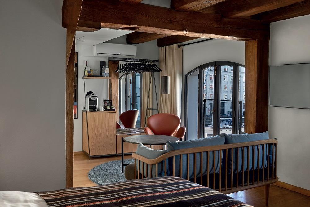 Suite Deluxe View with Exposed Pomeranian Pine Beams and French Doors
