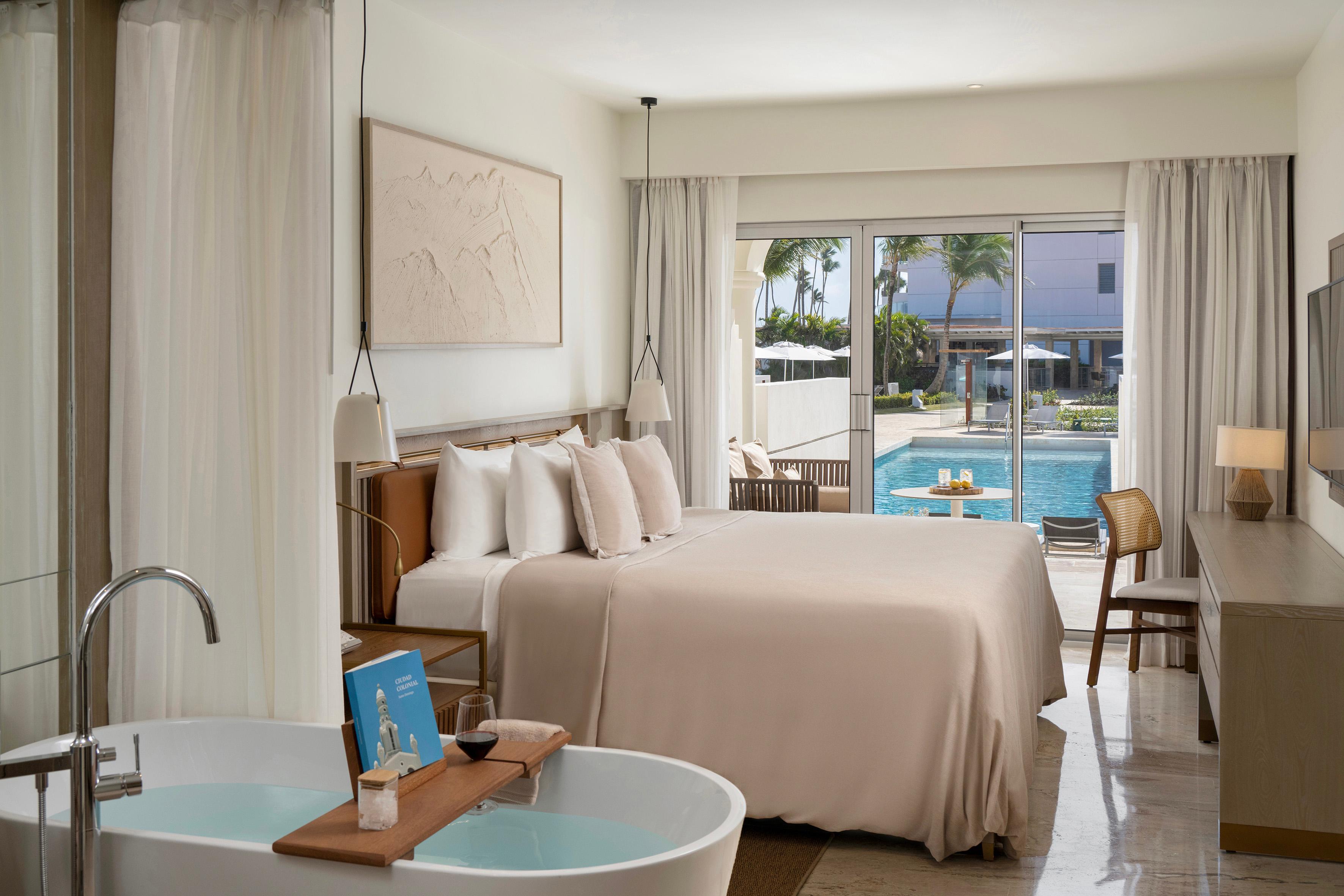 NIKTÃ‰ Master Suite Swim-Up bedroom with direct terrace access