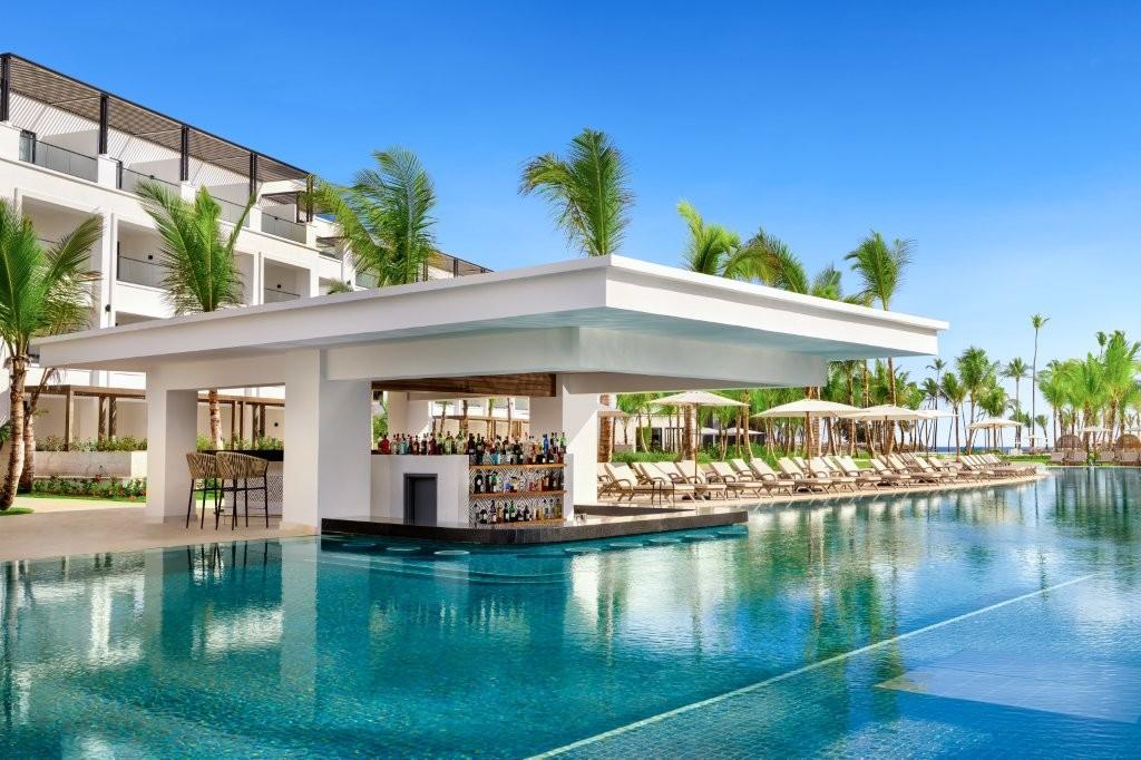 Secrets Tides Punta Cana swim-up pool bar and tropical lagoon grounds