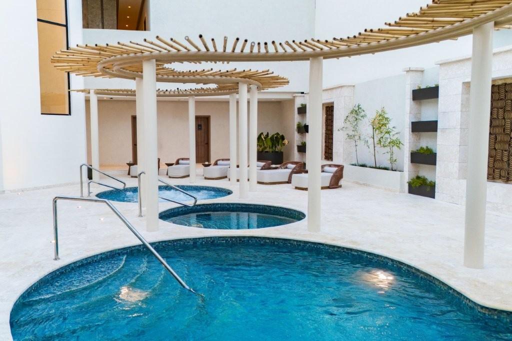 Secrets Spa by Pevonia hydrotherapy pool and water cascades