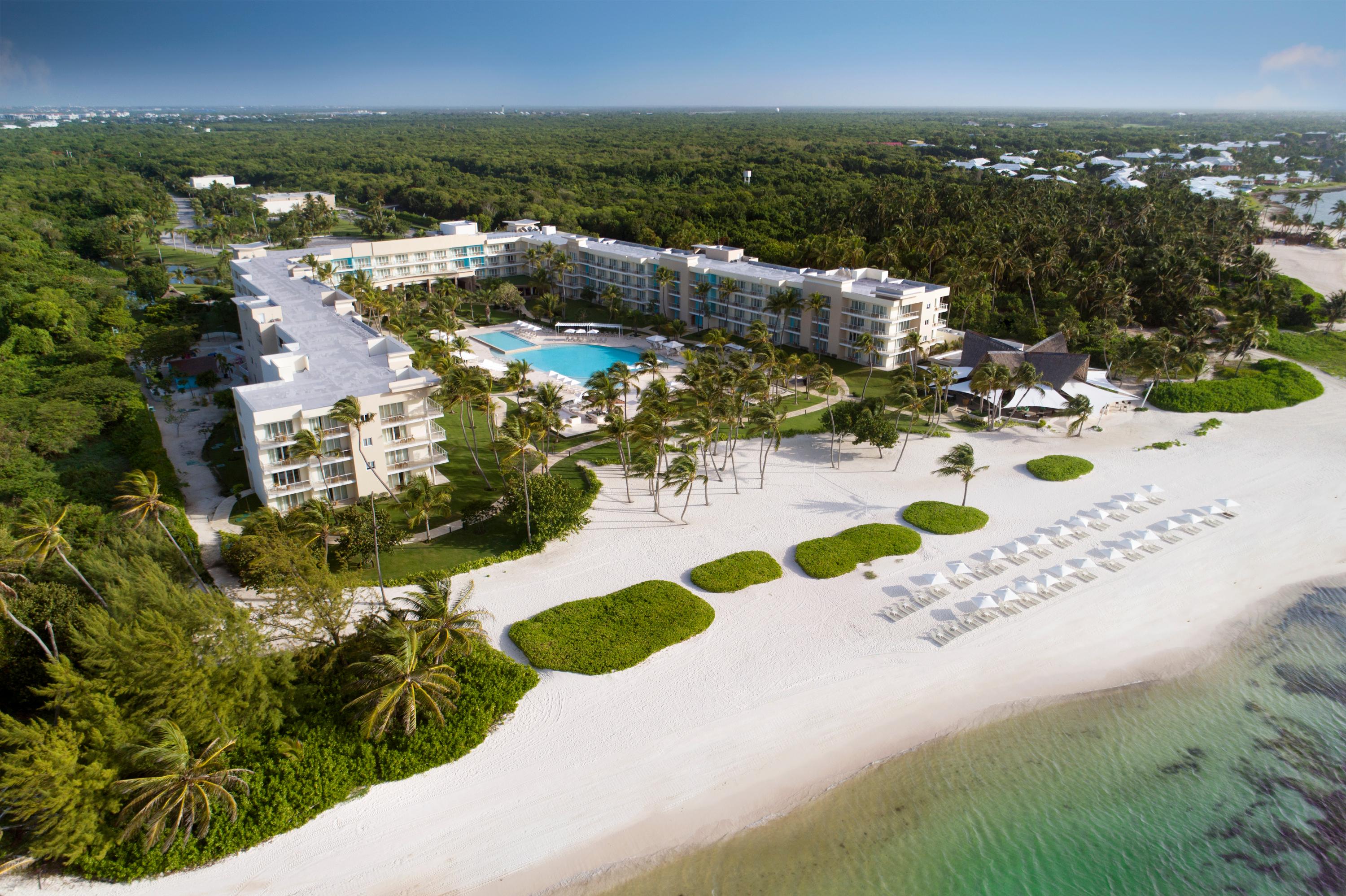 The Westin Puntacana Resort overview of oceanfront grounds, pool, and Playa Blanca