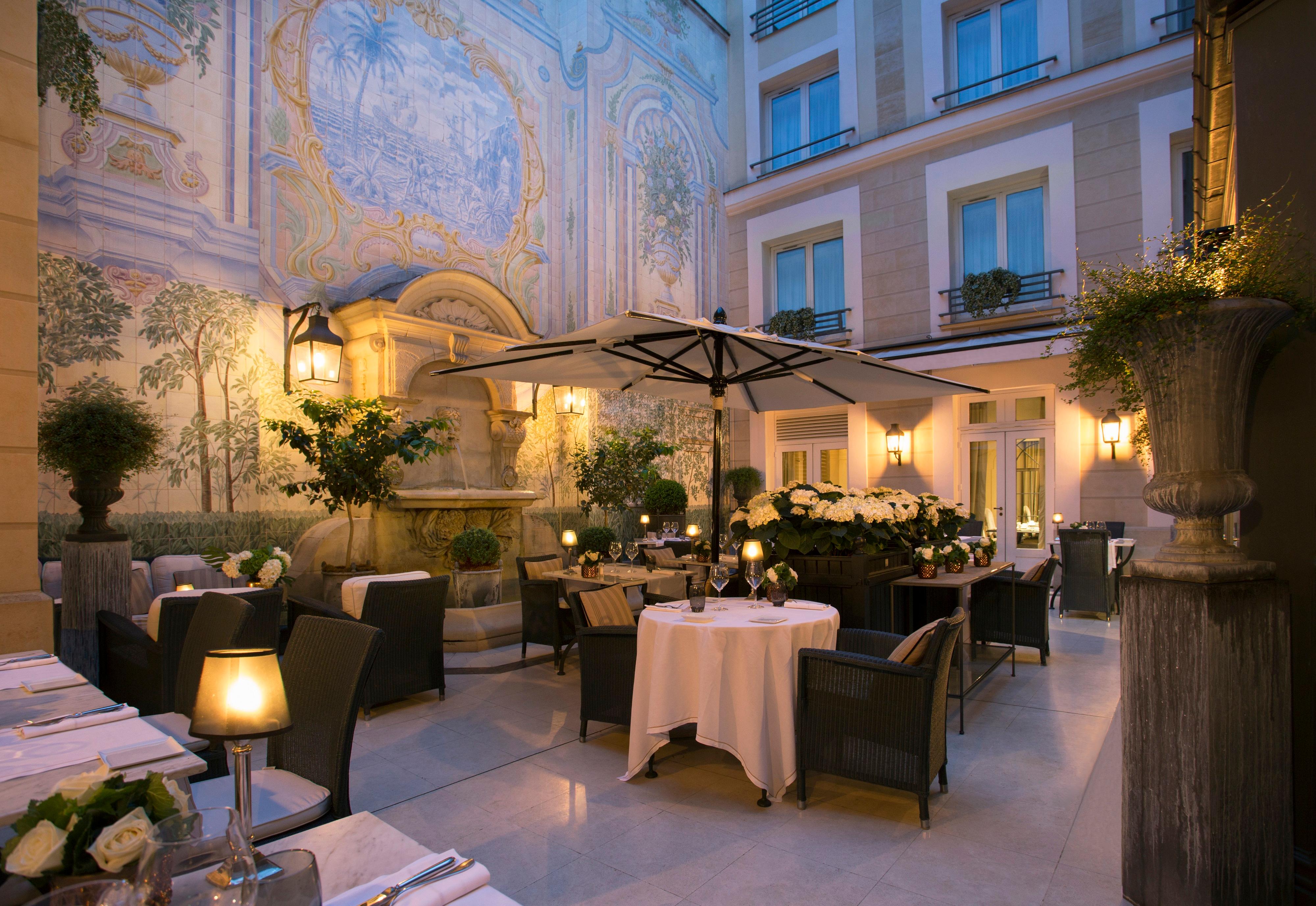 Castille Paris romantic open-air Italian patio courtyard with Renaissance fountain