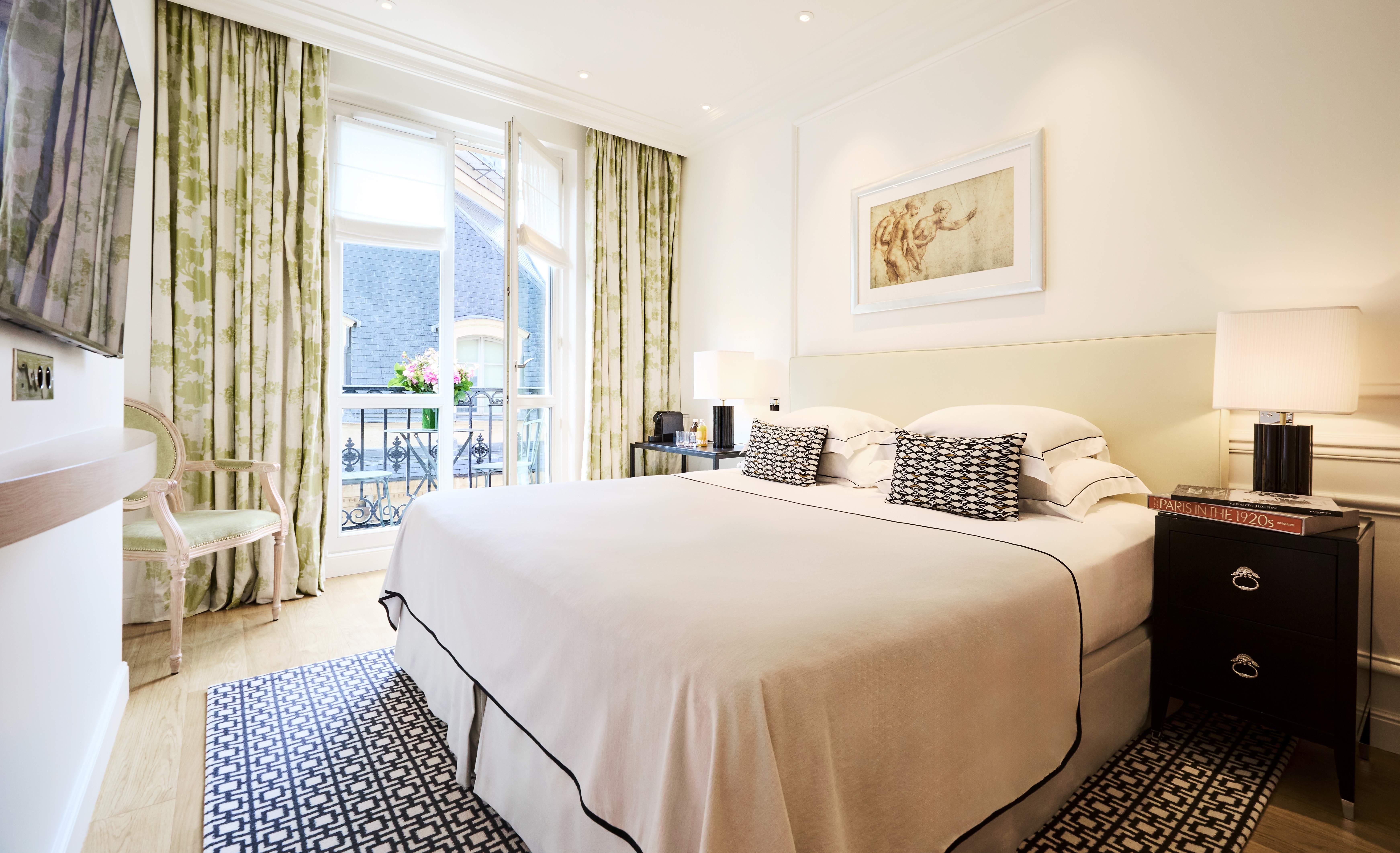 Chic Parisian Balcony Room with Palais Royal views