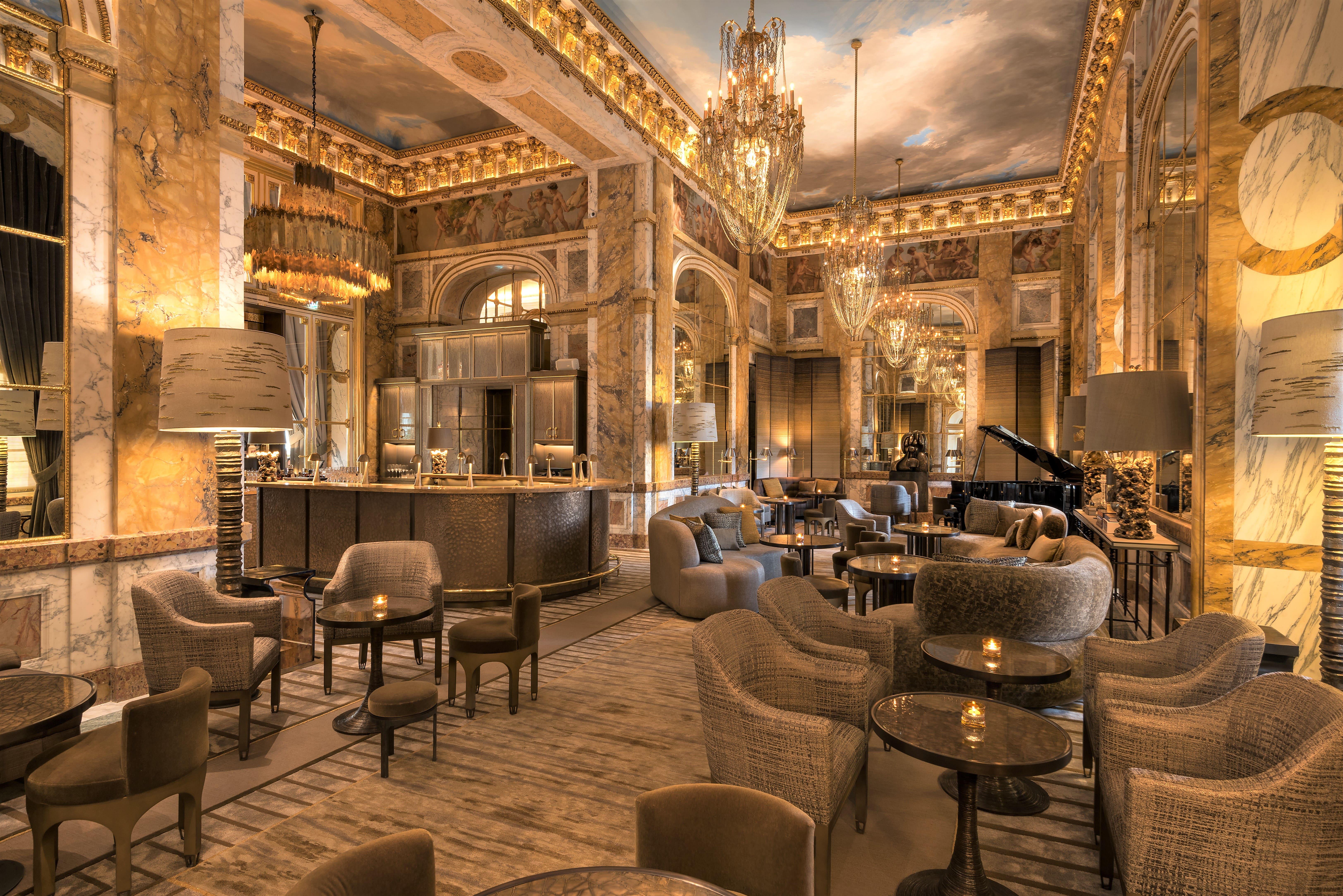Bar Les Ambassadeurs historic salon with crystal chandeliers