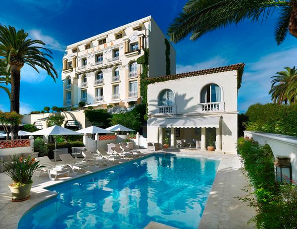 Hotel Juana historic 1930s Art Deco facade facing La Pinede in Cap d'Antibes