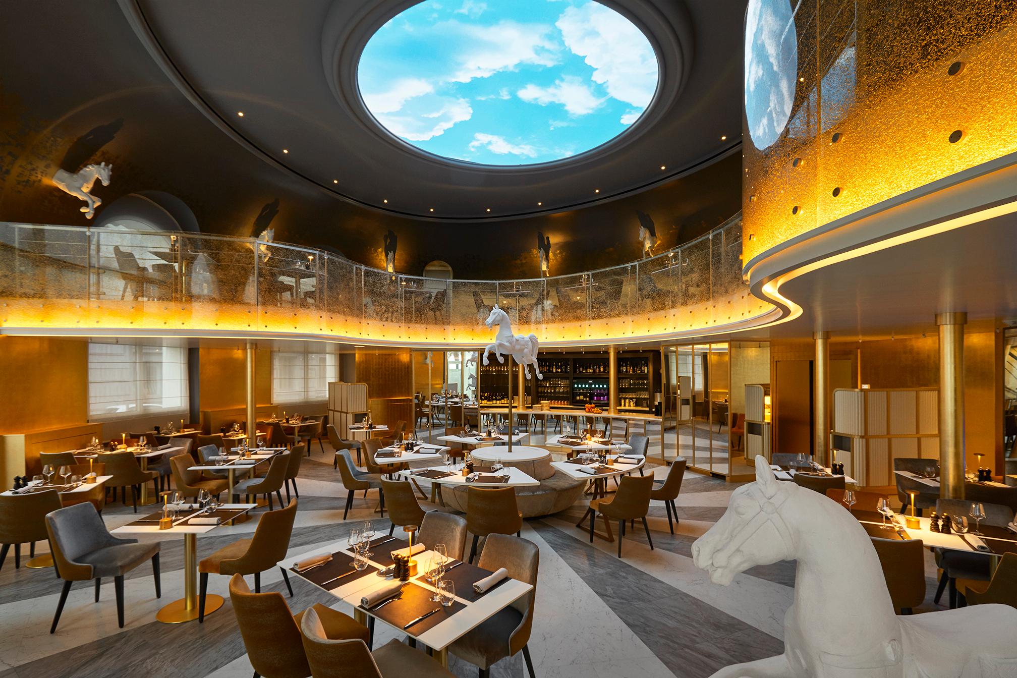 Vibrant and chic La Rotonde Riviera brasserie in white and gold