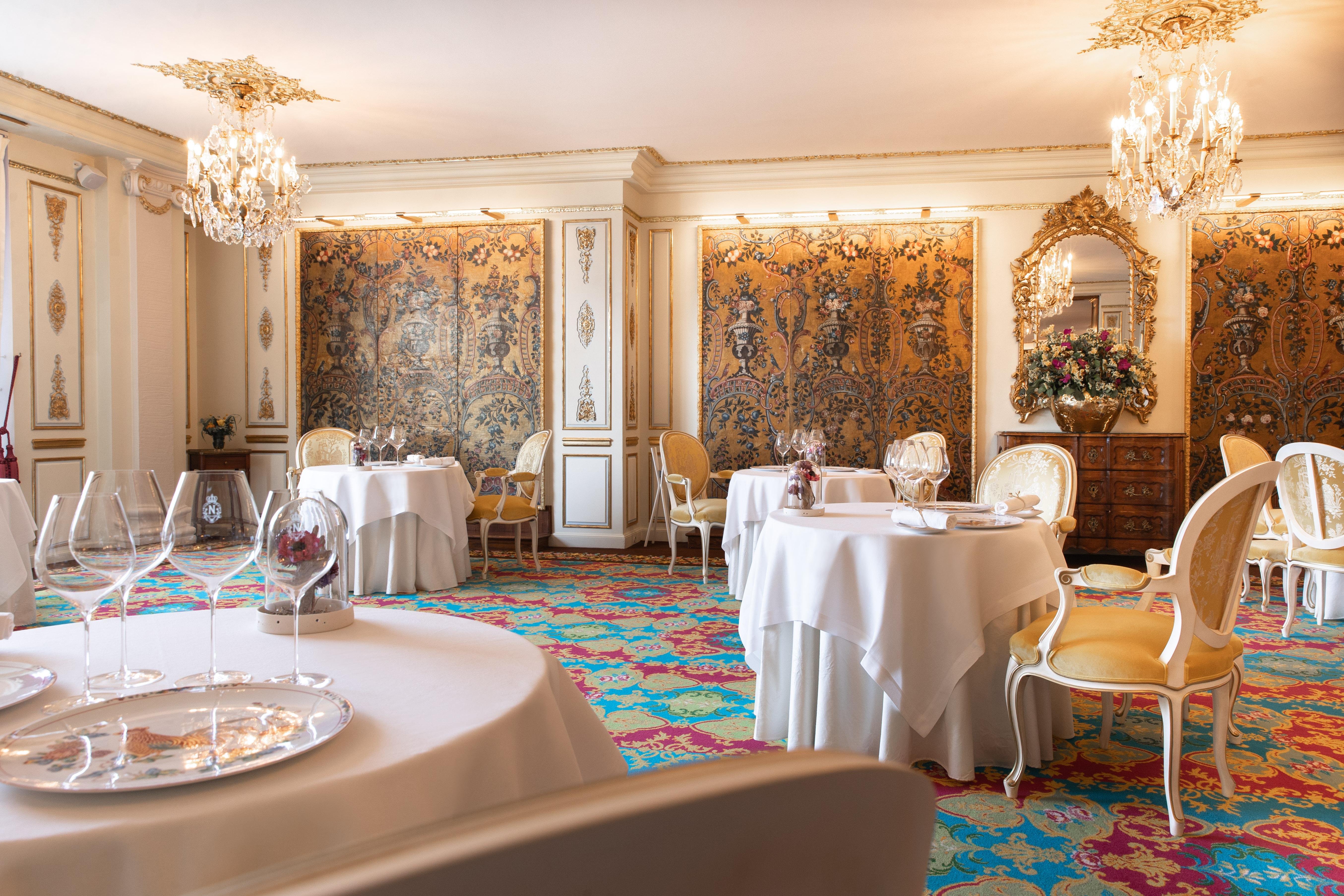 Michelin-starred Le Chantecler restaurant with 18th-century woodwork