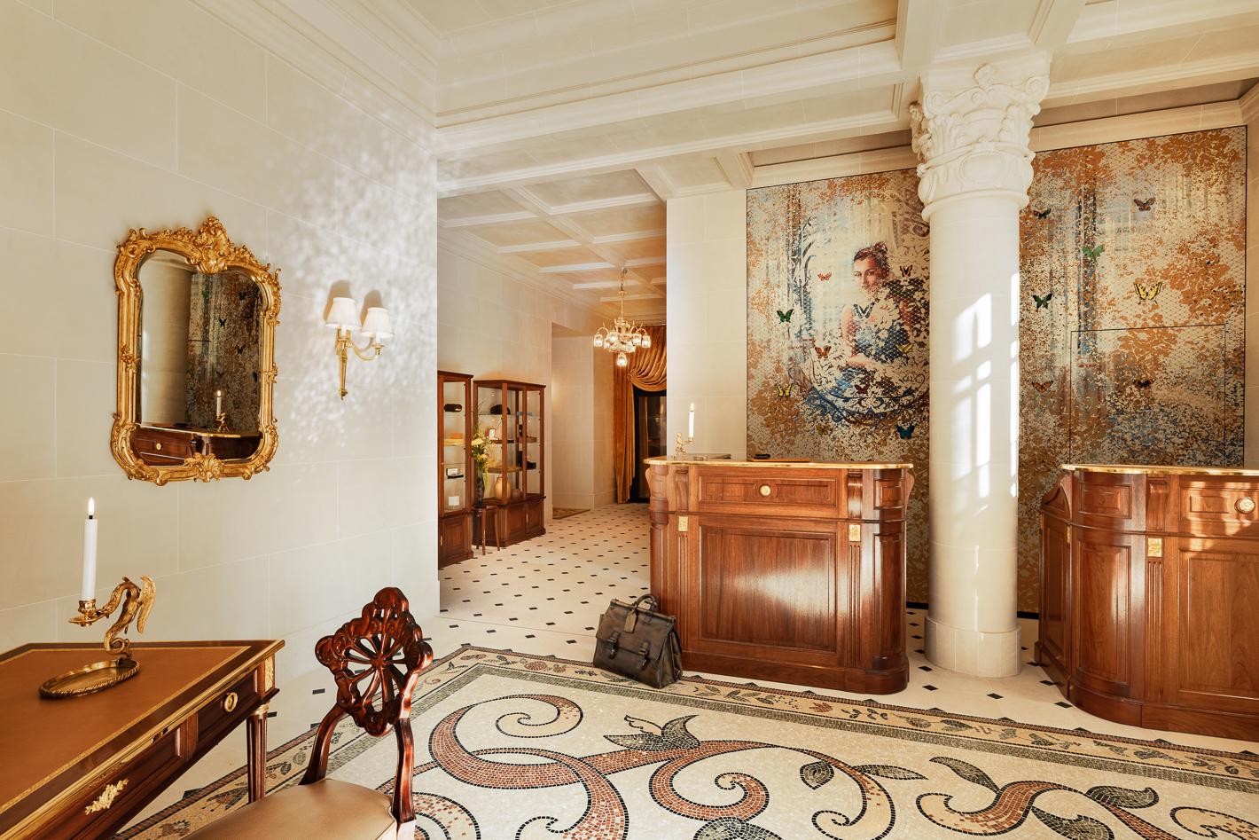 Warm wood-paneled reception and designer salon at Hotel Madame Reve Paris