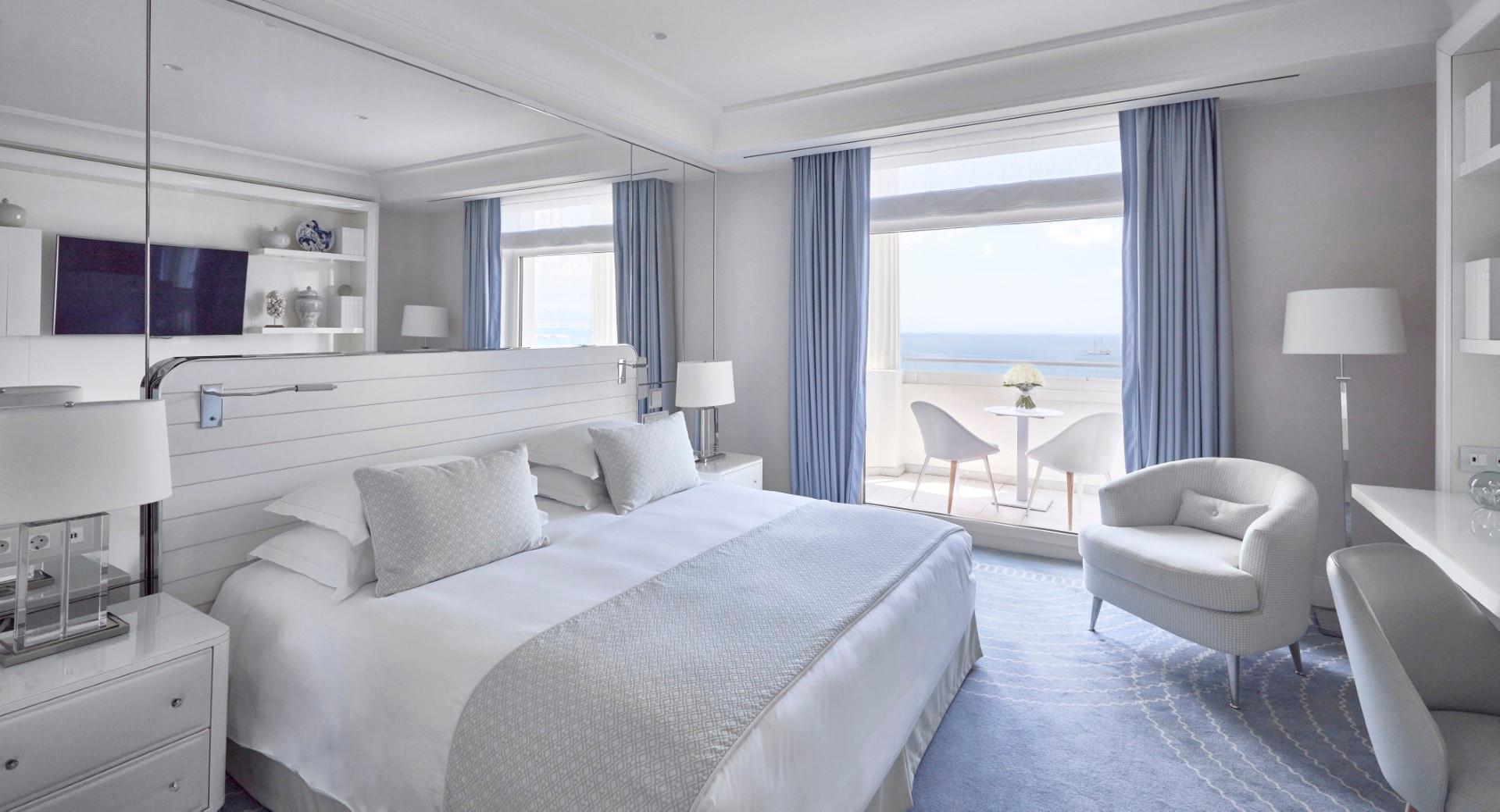 Premium Sea View Room private balcony framing the azure Bay of Cannes