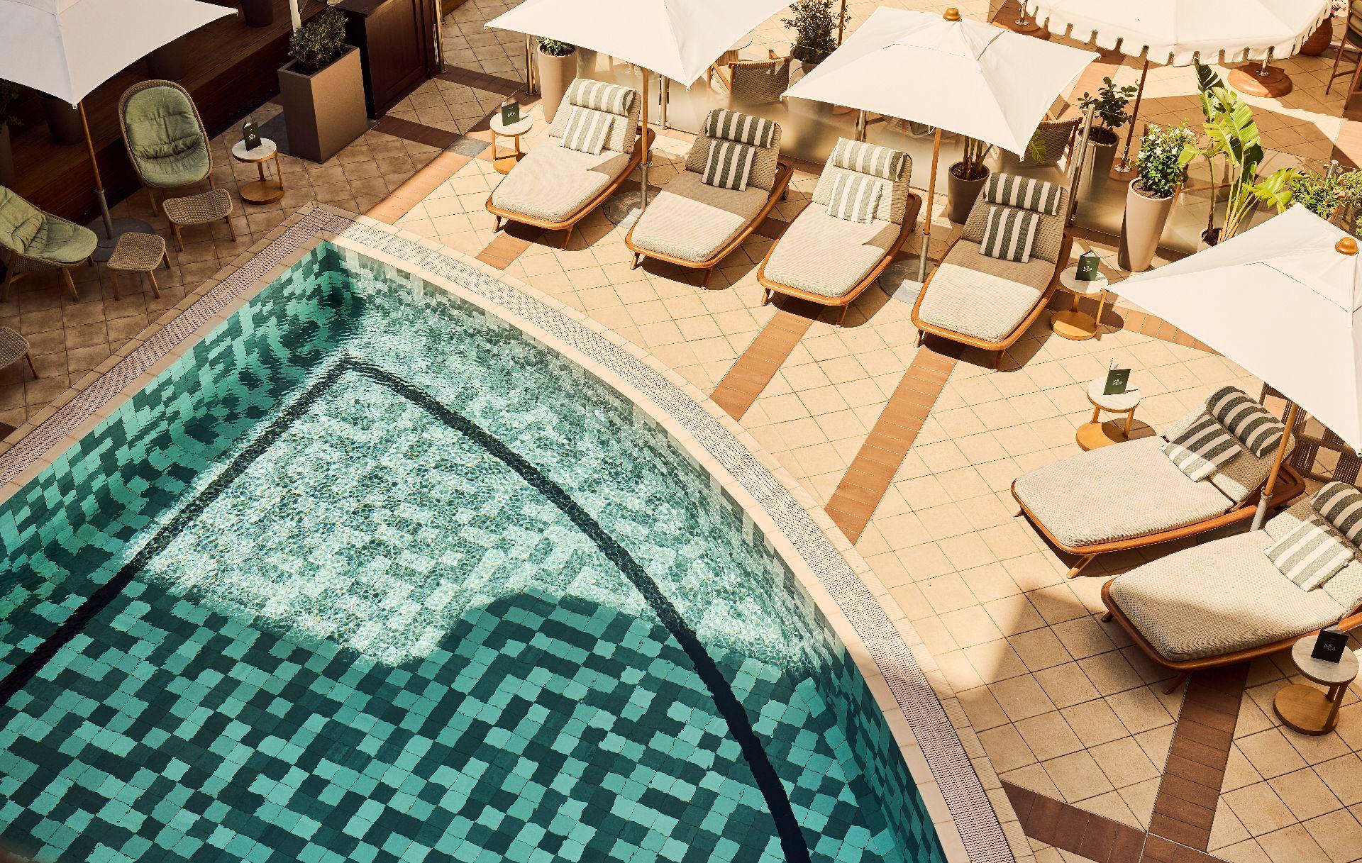 Heated indoor and outdoor pool with Mediterranean sea views