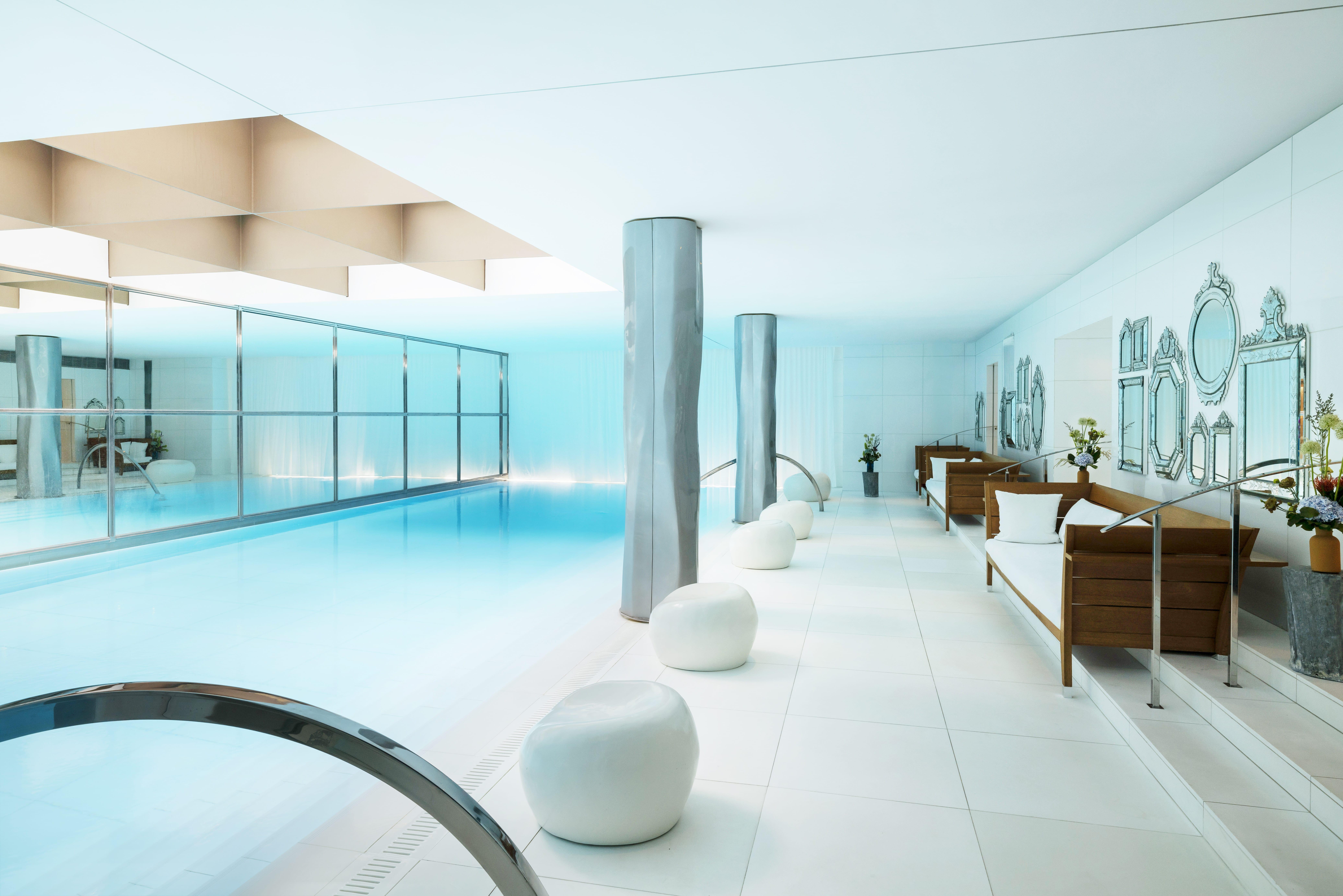 Raffles Spa 23-Meter White Marble Swimming Pool