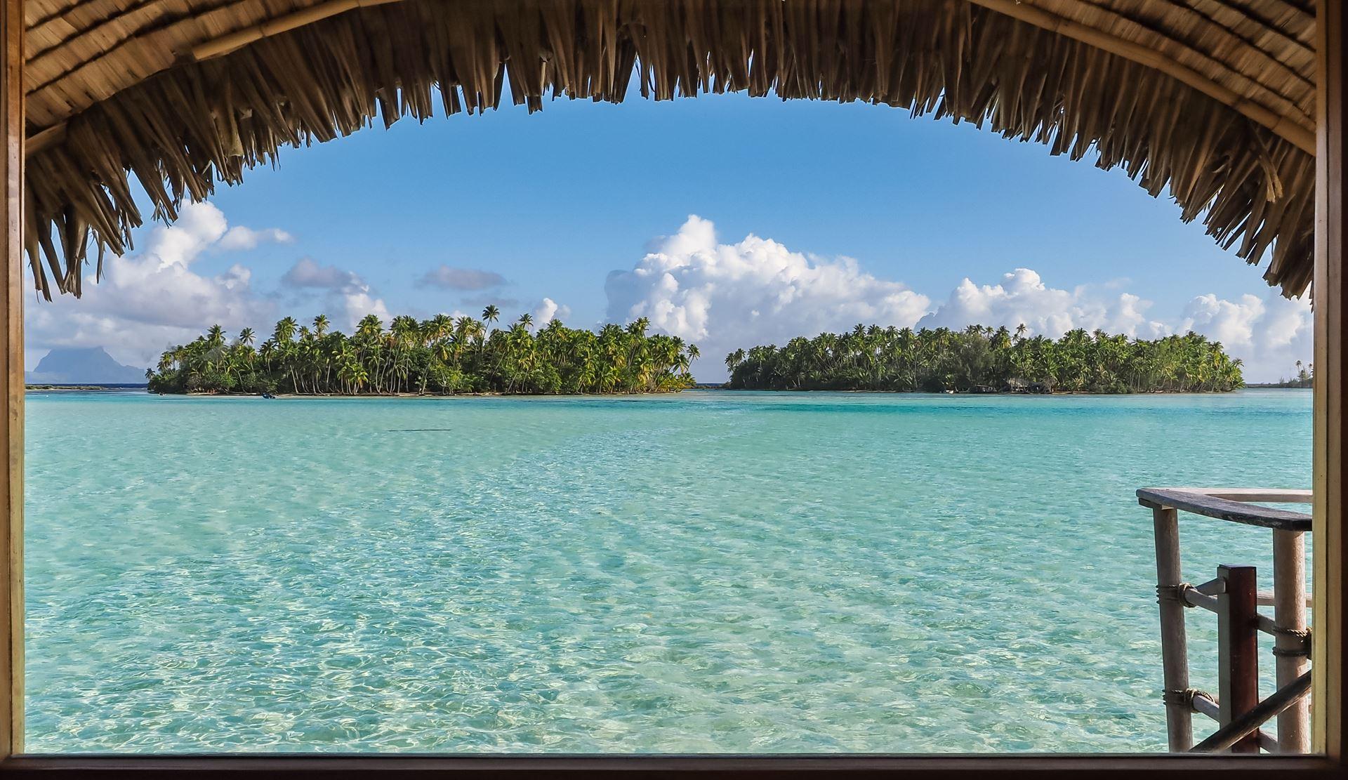 Bora Bora Overwater Suite framing distant Mount Otemanu horizons