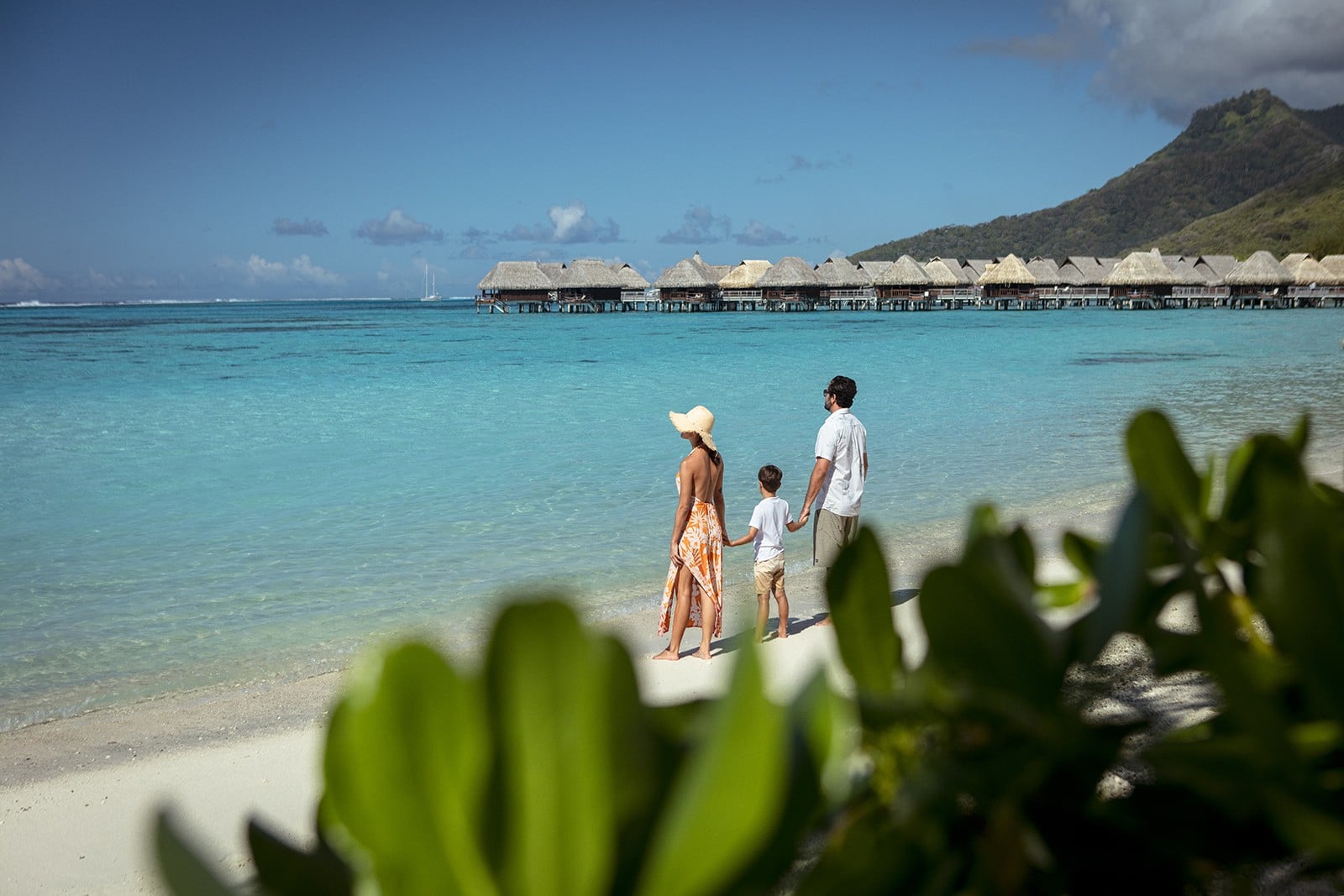 Overwater bungalow pontoon boardwalk at Sofitel Moorea