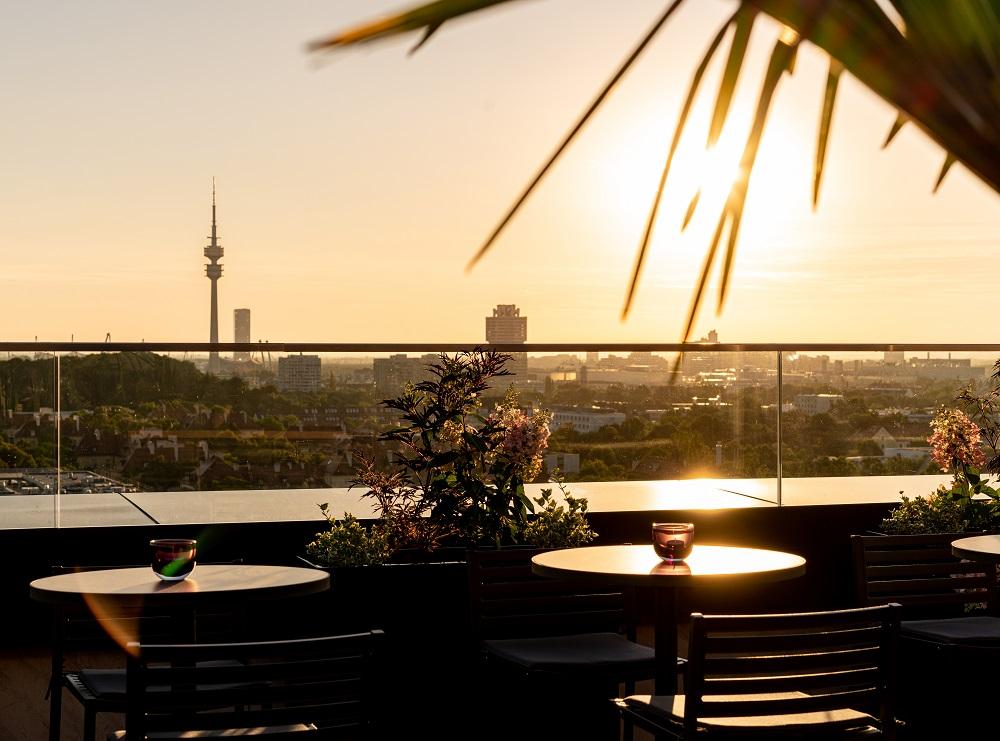 M'Uniqo Rooftop Bar Panoramic Terrace Overlooking Munich Skyline and the Alps
