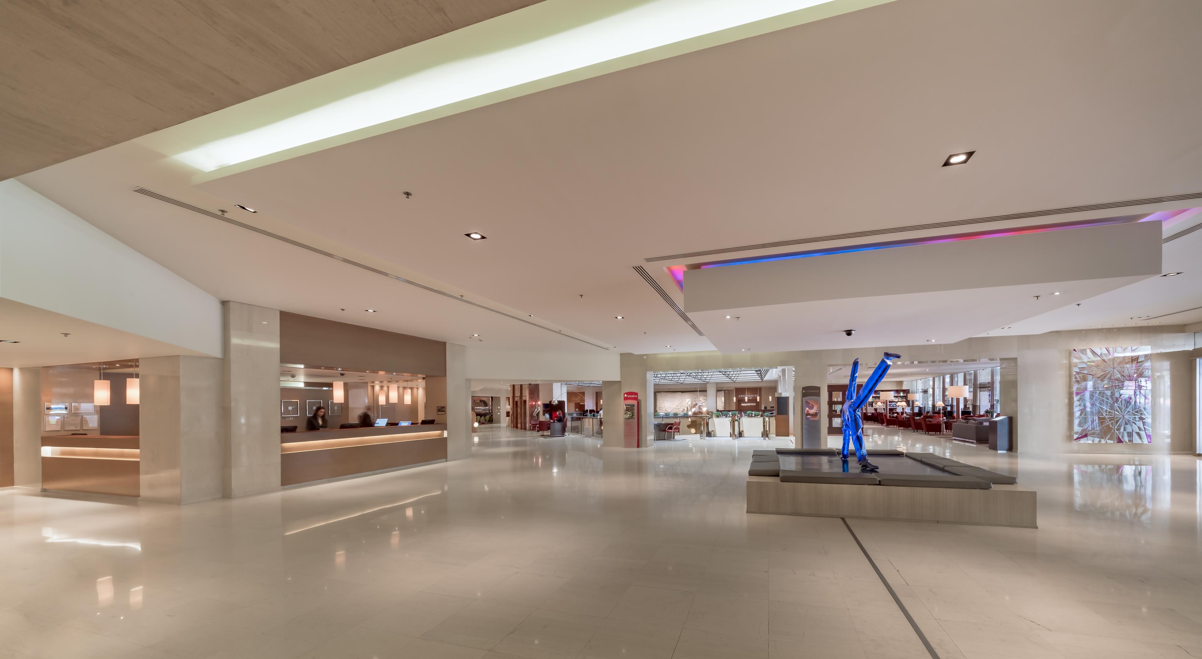 Sophisticated luxury suite interior featuring commissioned works of Modern Greek art