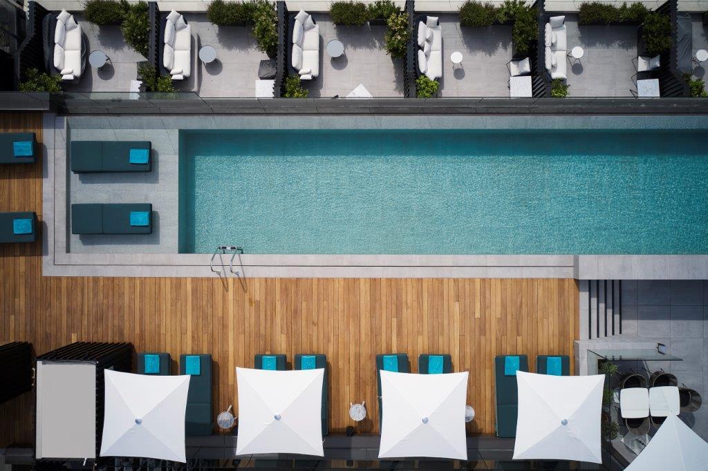 Breathtaking rooftop infinity pool overlooking the Athenian skyline and Acropolis